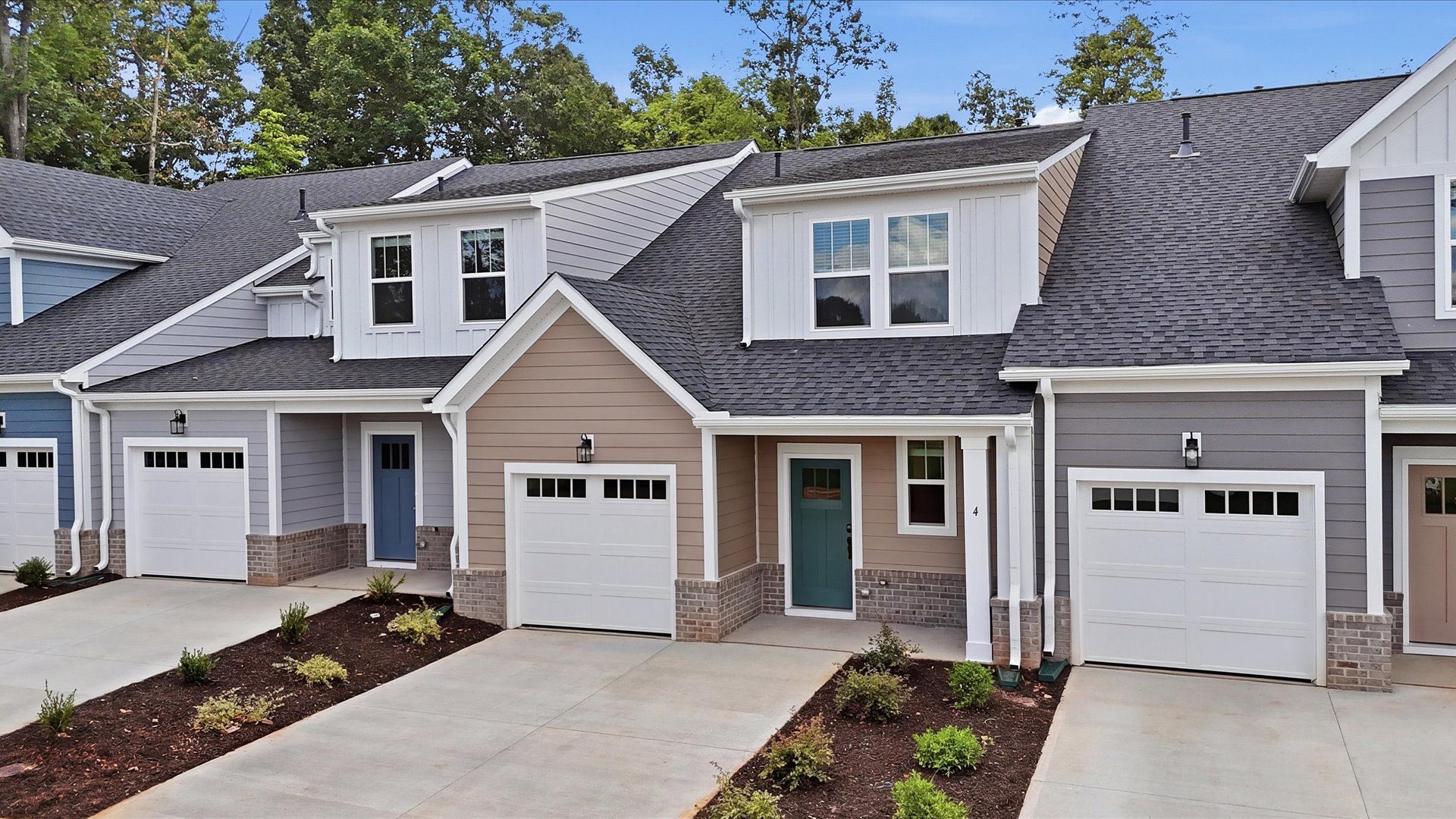 Clean lines, elegant details, and lasting curb appeal define this beautifully designed villa