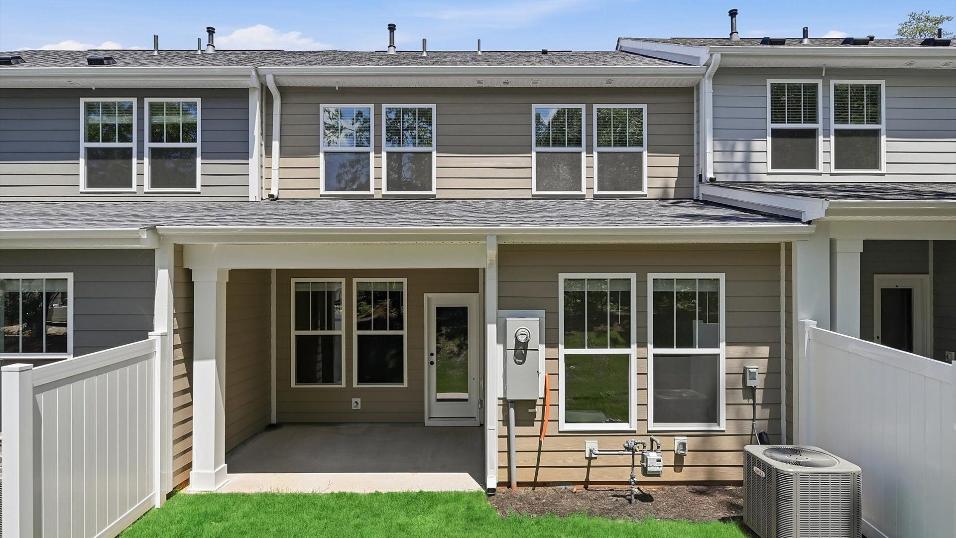 Step outside to a covered rear porch that makes every day feel a little more relaxing