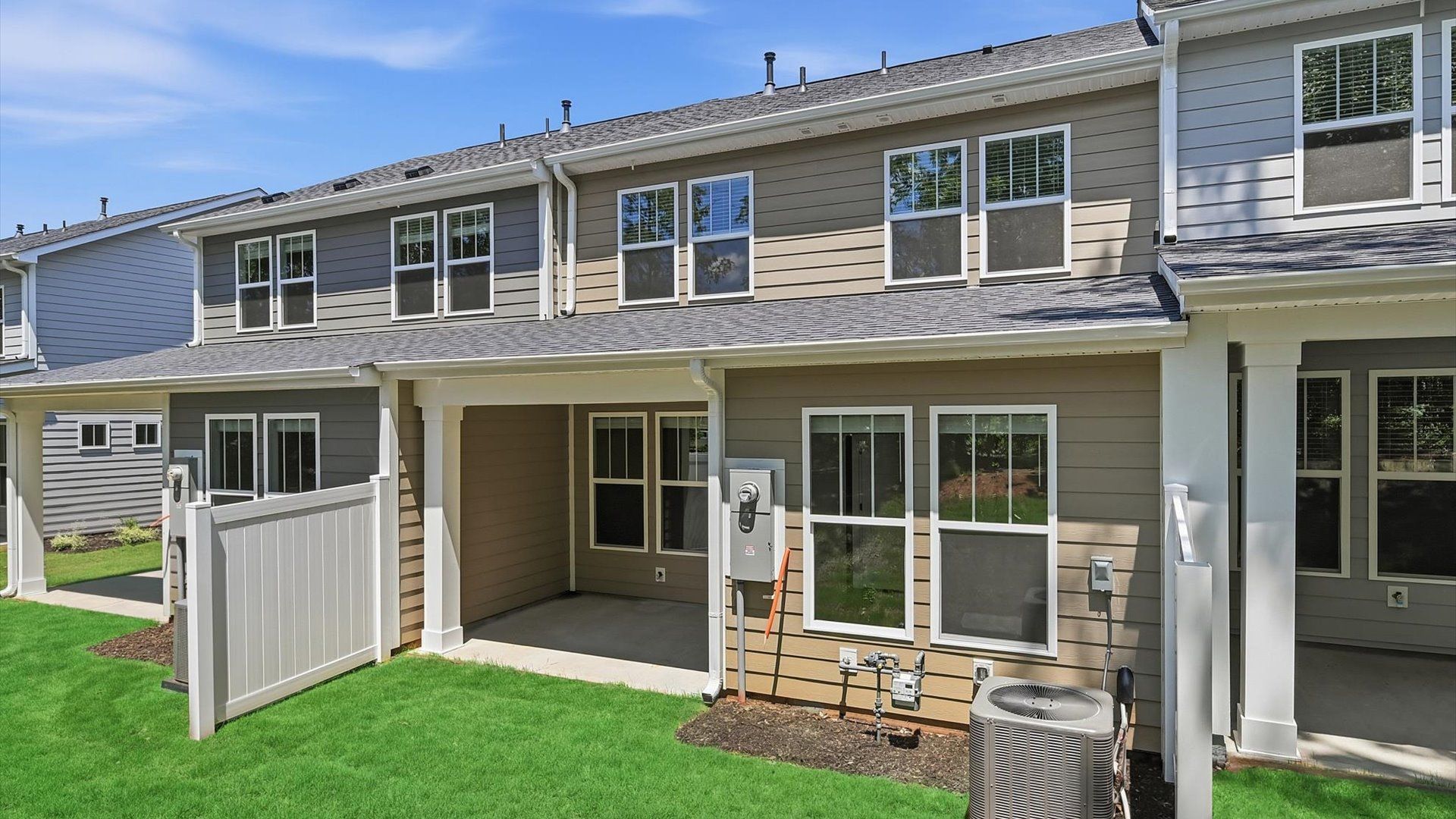Beautiful rear elevation complemented by a welcoming covered porch