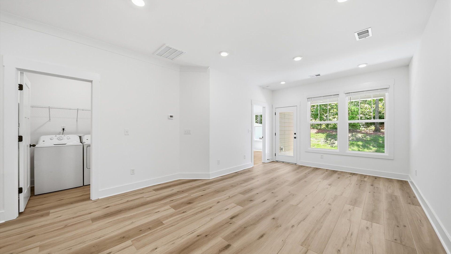 Spacious family room with accomplished design and eye-catching details throughout