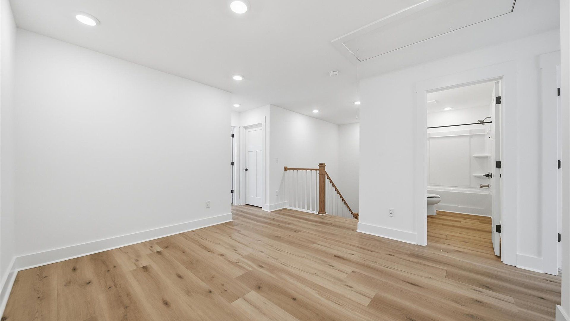 Bright loft with hardwood flooring and a comfortable setting for entertaining or quiet evenings