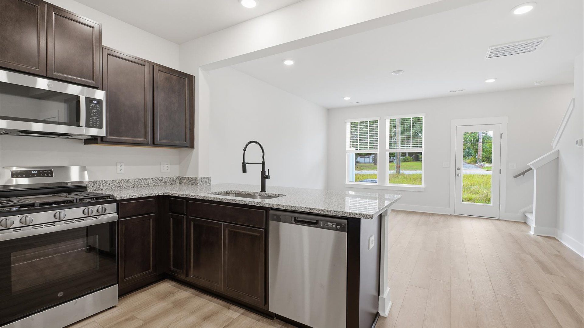 Warm and welcoming kitchen showcasing quality craftsmanship and a layout designed for modern living