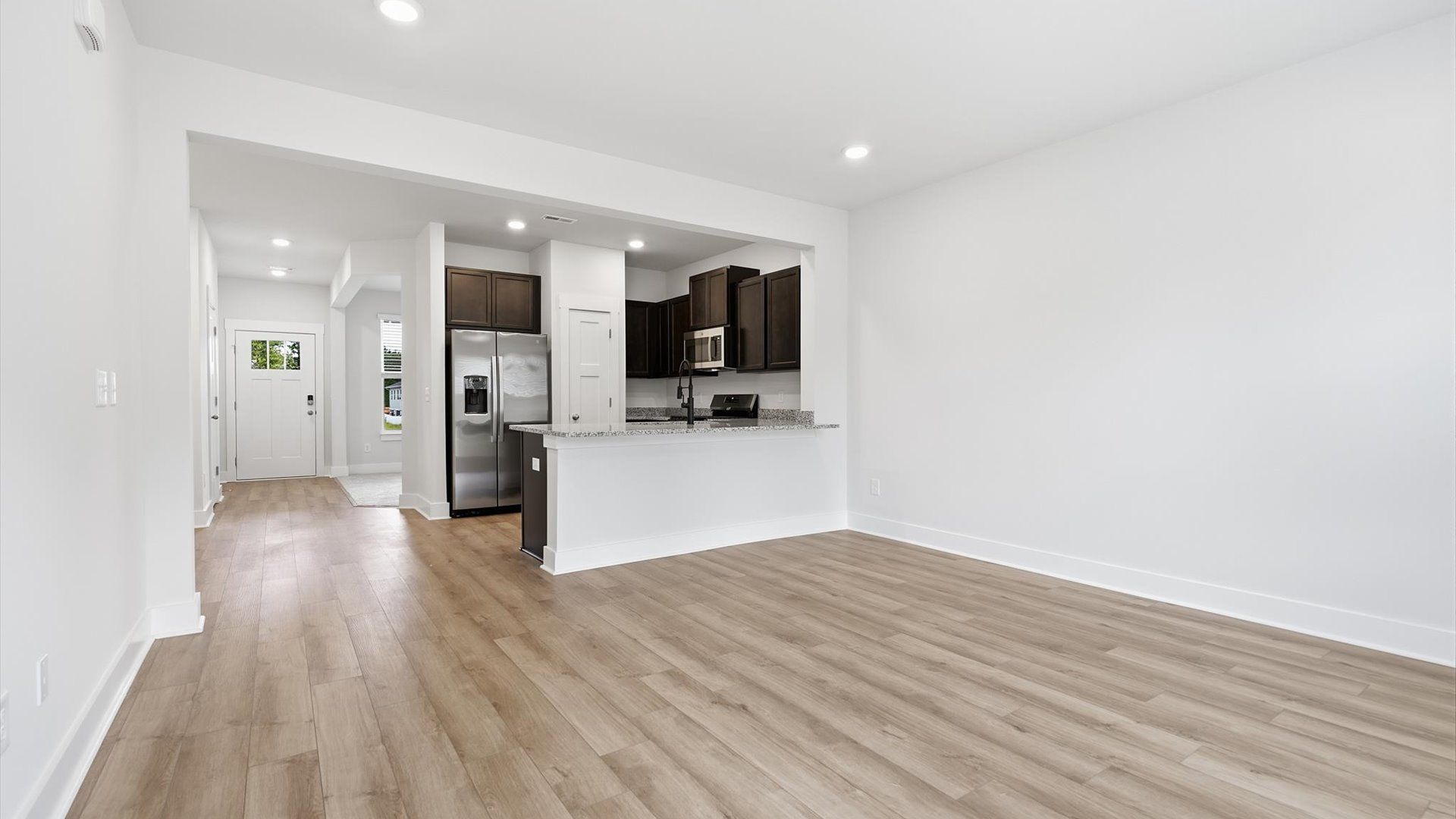 Highly functional family room with established charm and current styling in a reputable community