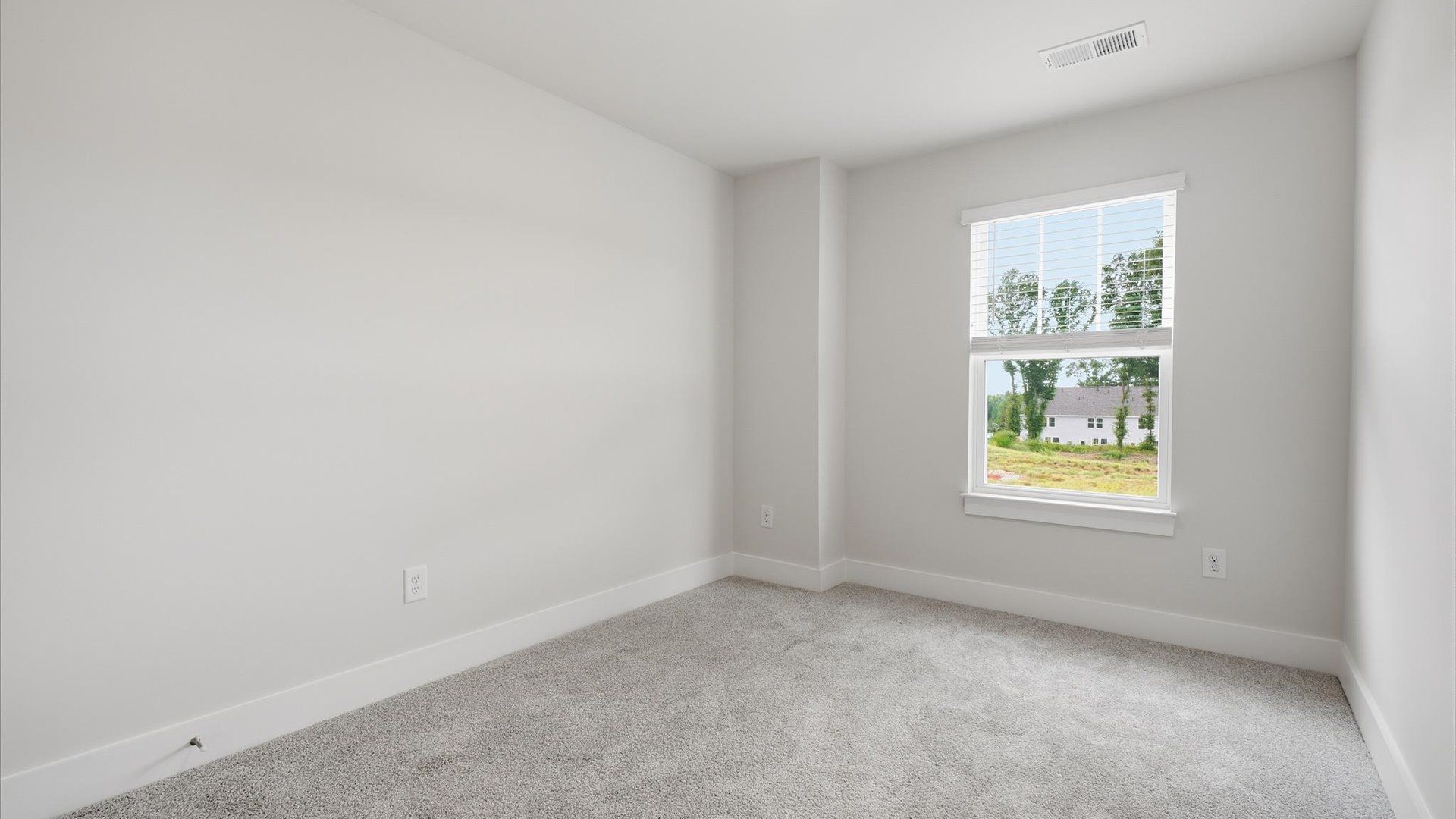Memorable space offering plush carpet underfoot and a thoughtfully planned walk-in closet