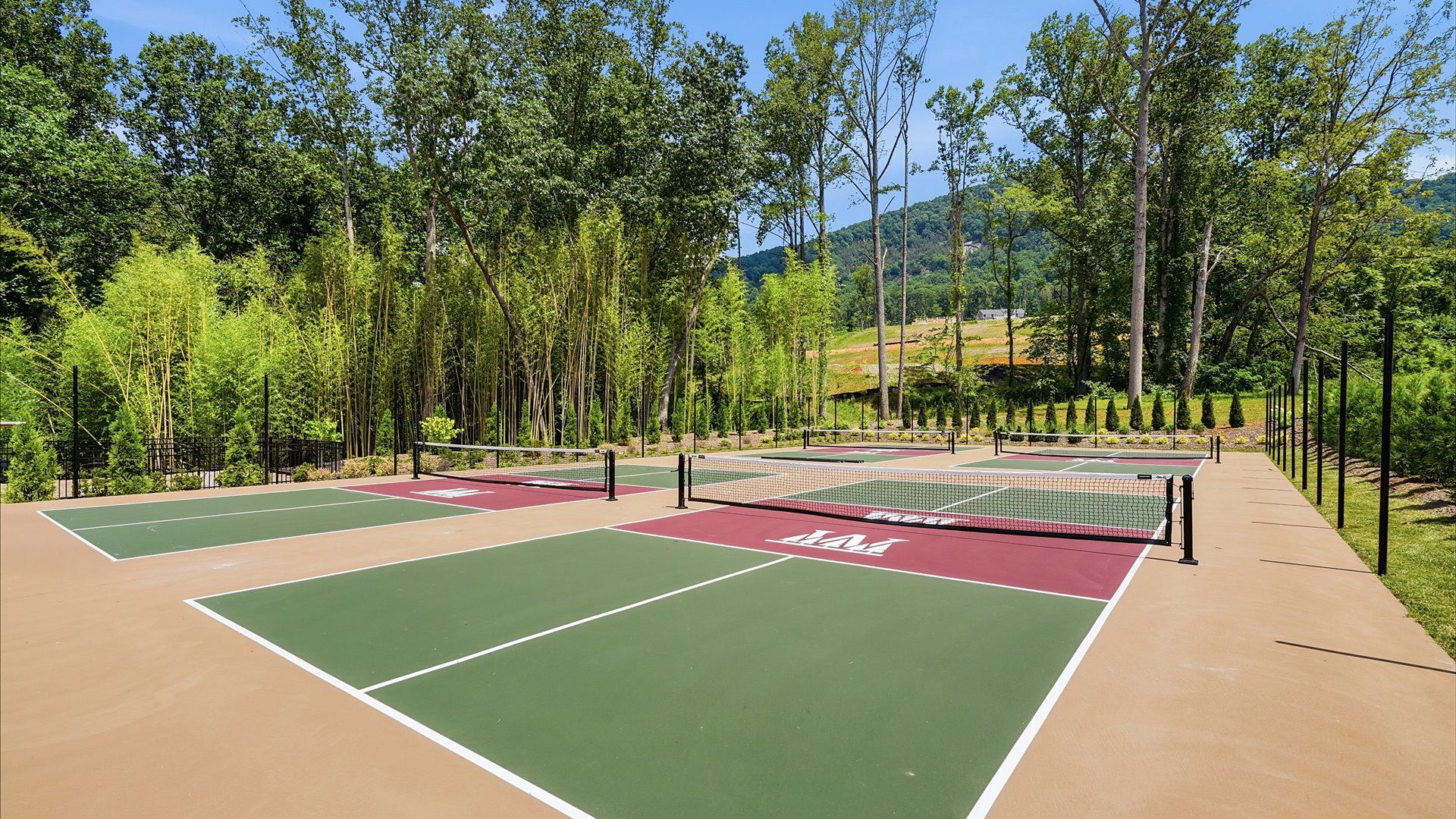 Mountain living means more opportunities to play, connect, and unwind on the pickleball courts at The Wilds at Cedar Mountain
