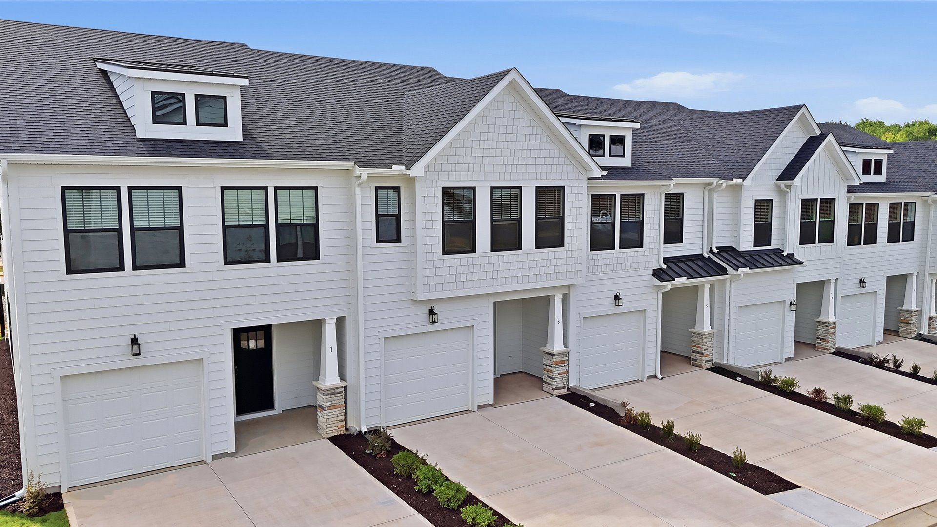 Refined exterior design with balanced architectural detail in this distinguished two-story villa located at Gresham Station
