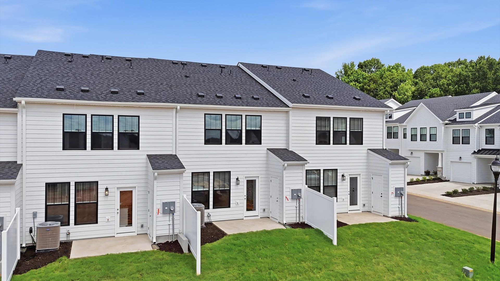 Superior curb appeal continues to the back with a refined, private backyard located in Simpsonville, SC