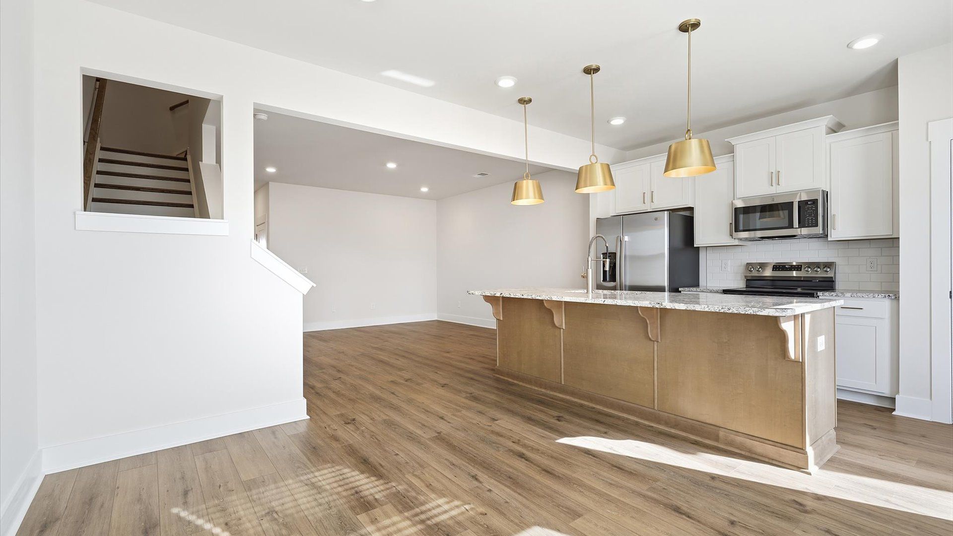 Inviting breakfast area with a seamless connection to the kitchen for everyday living by DRB Homes