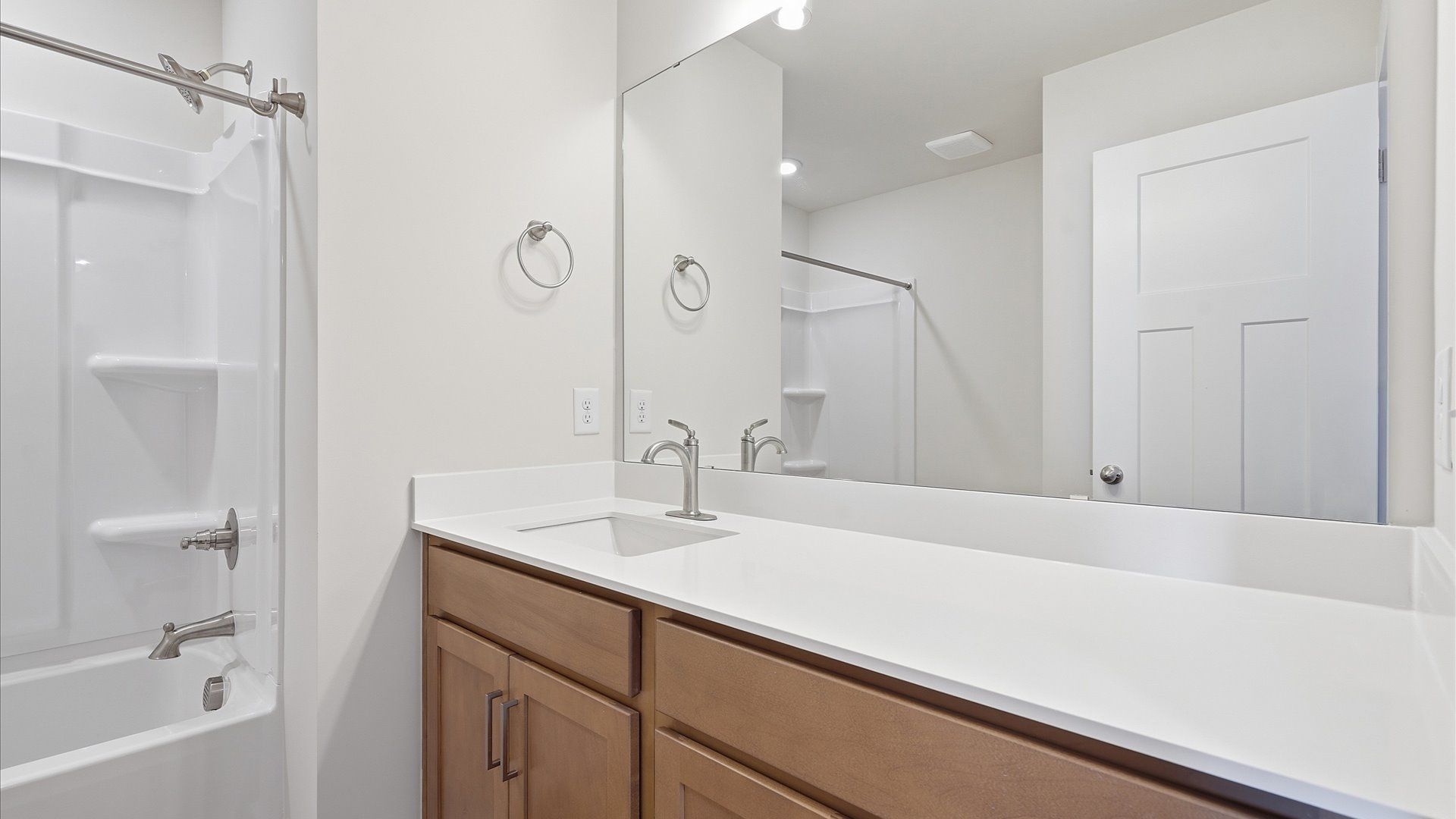 Top-notch bathroom with current fixtures, tasteful materials, and elevated charm in Simpsonville, SC
