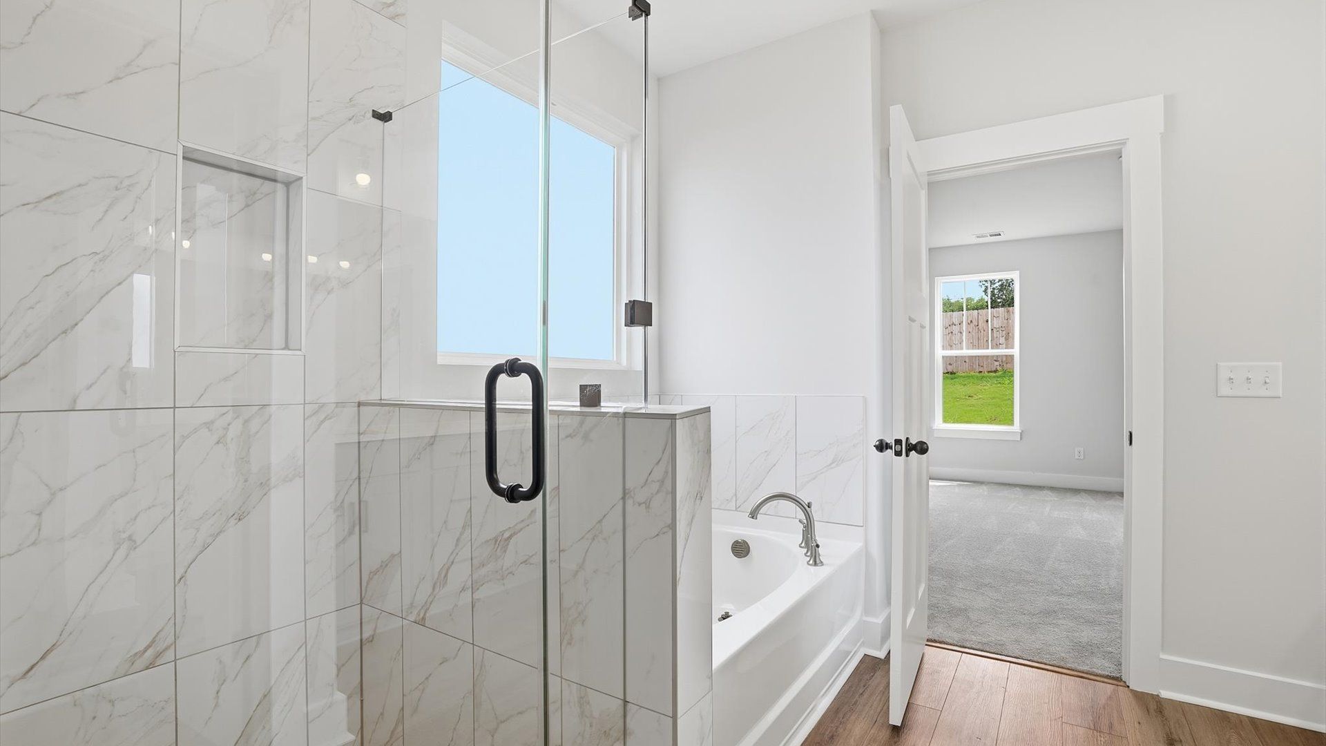 Exceptional en-suite with a glass-enclosed walk-in shower for superior everyday comfort at Woodglen