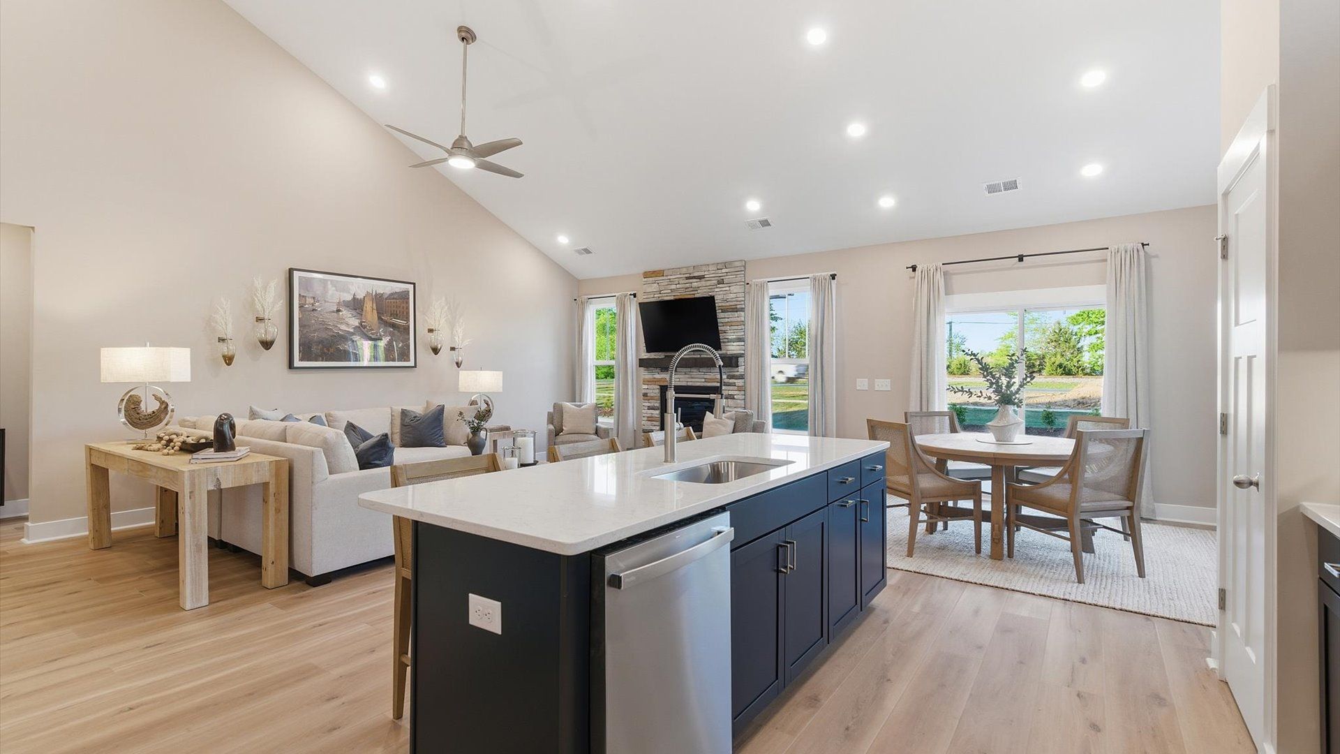 Exclusive living space with towering ceilings, tasteful finishes, and a warm, welcoming feel