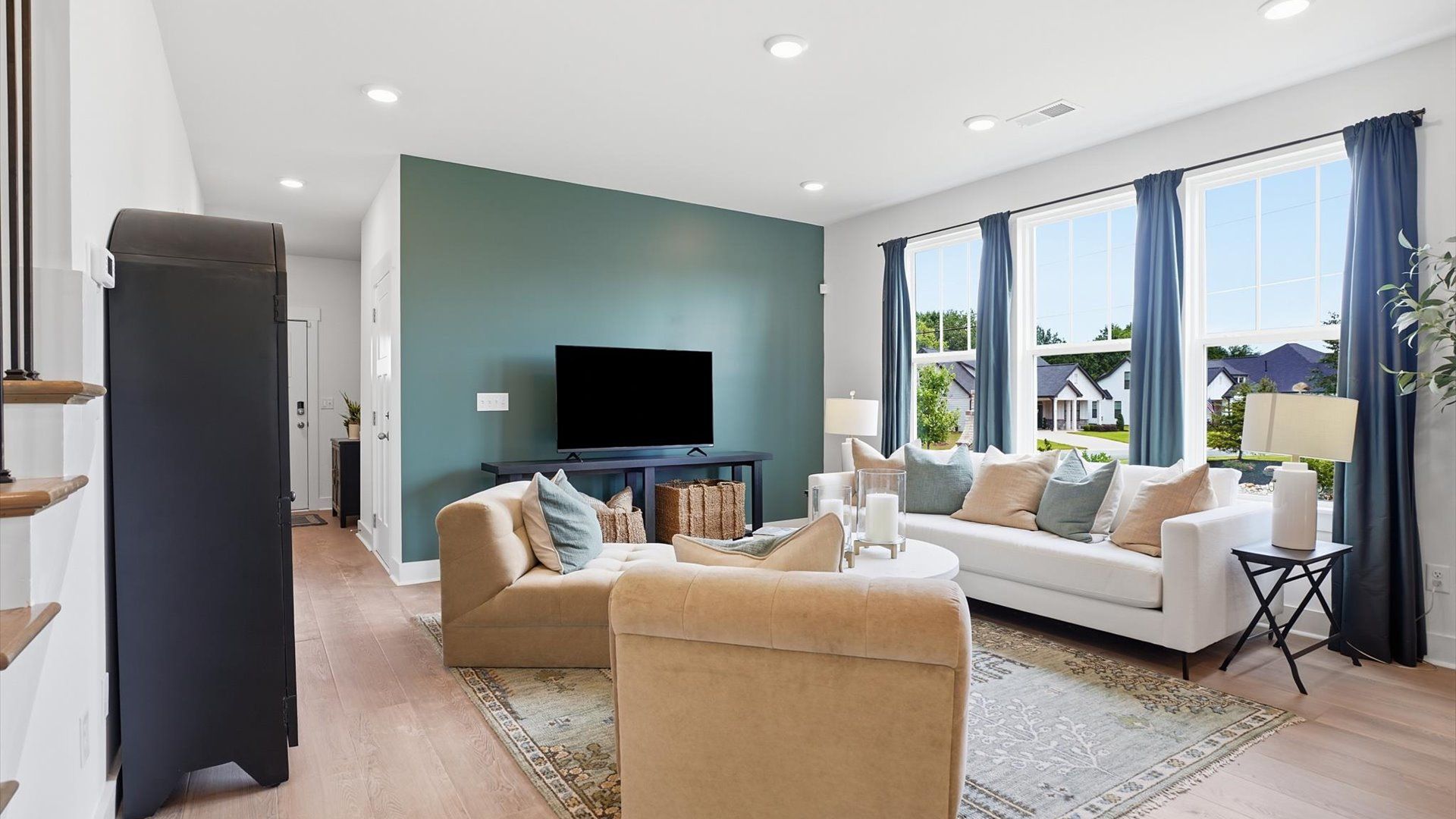 Exceptional family space with hardwood floors and seamless flow to dining and kitchen areas at Anna's Pointe