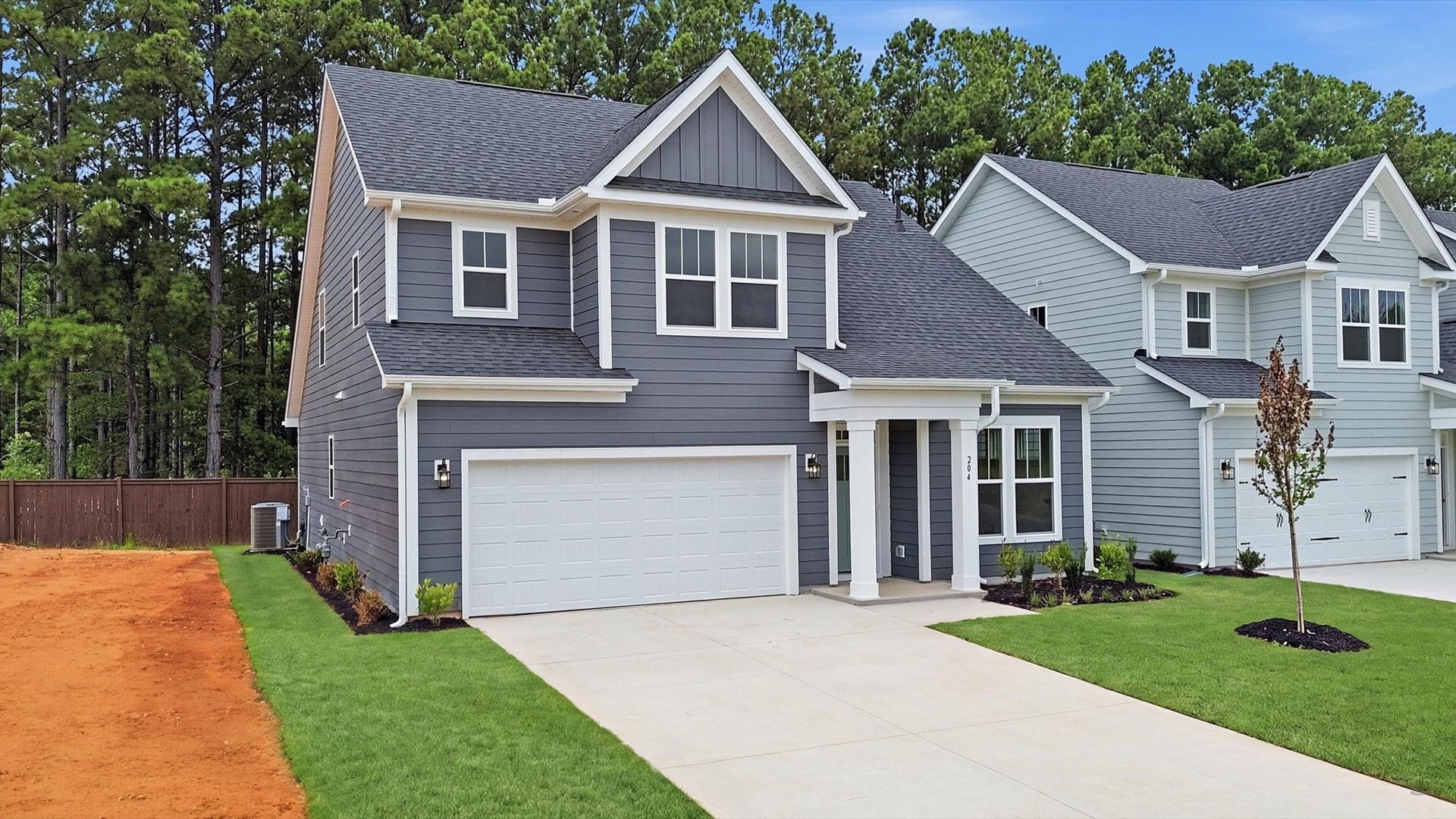 Exceptional home with tasteful exterior finishes and a thoughtfully designed façade located in Fountain Inn, SC