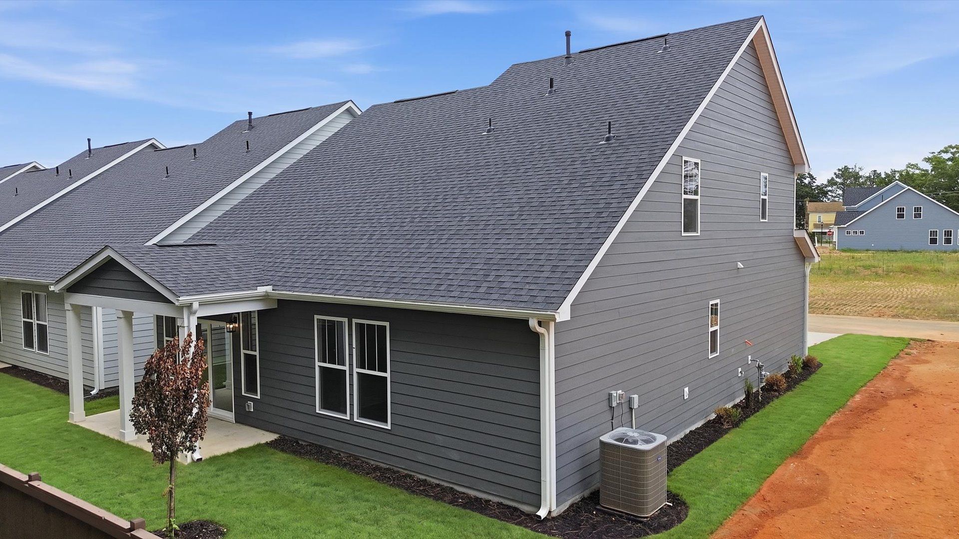 Exclusive rear covered porch with accomplished detail and elevated outdoor living potential by DRB Homes