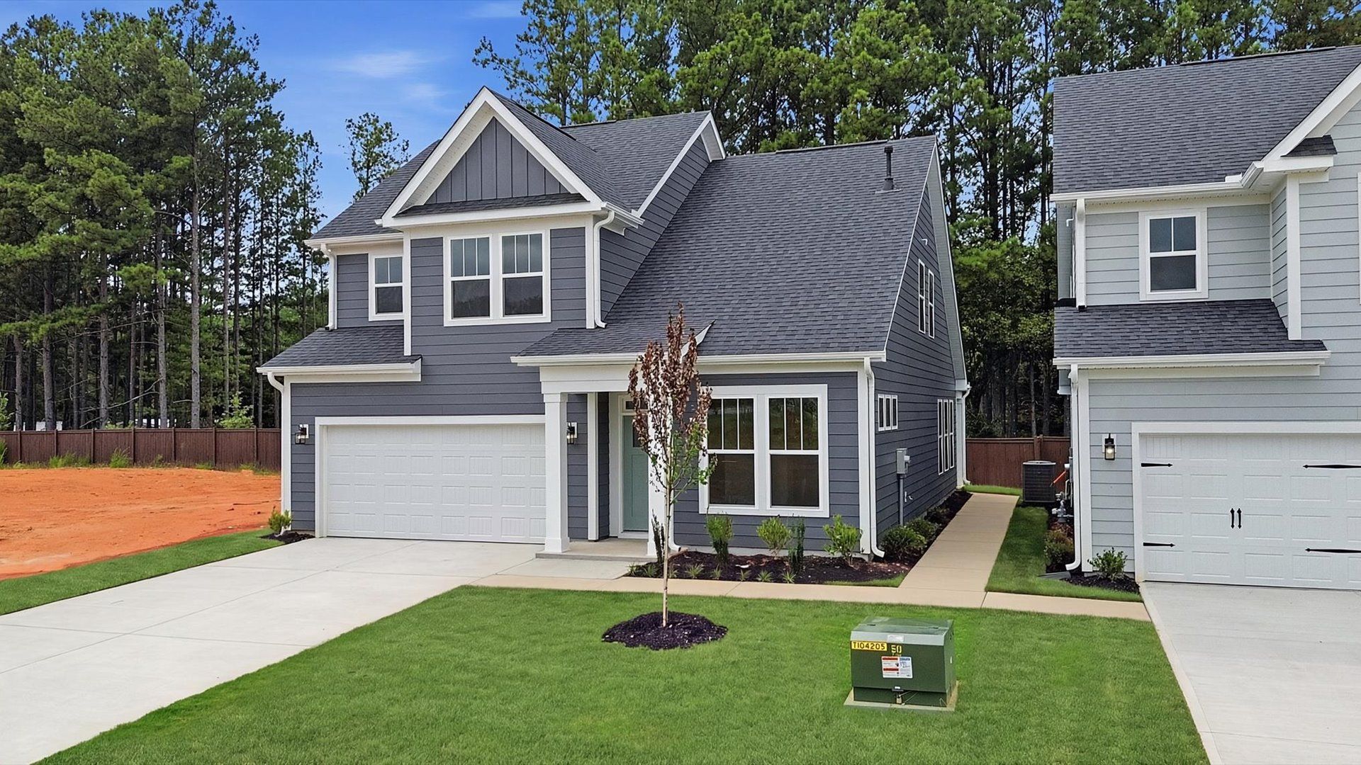 Eye-catching exterior with timeless color palette and superior architectural detail at Barton Hollow