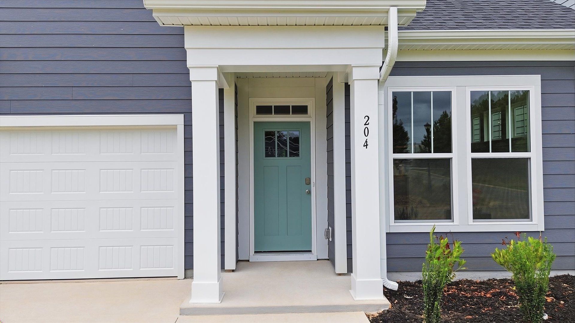 Warm and welcoming entry enhanced by polished finishes and thoughtful design near Downtown Fountain Inn