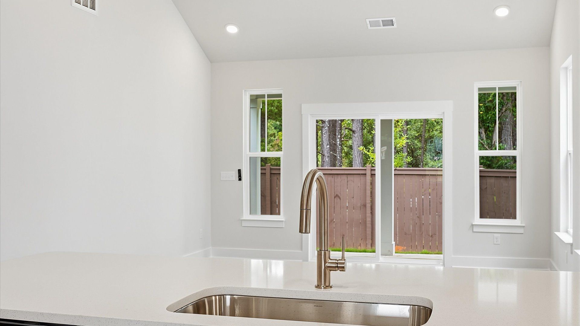 Thoughtfully crafted kitchen featuring stylish hardware and polished finishes