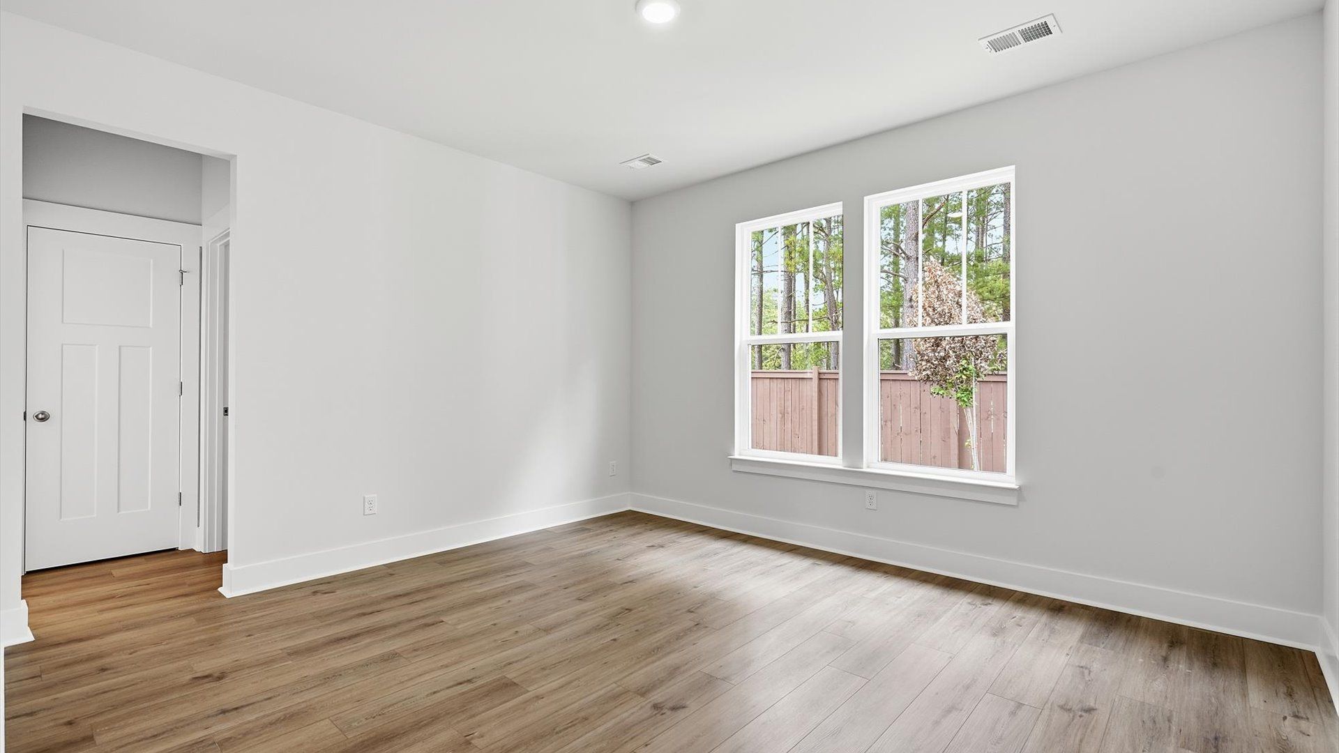 Highly skilled design shines in this elegant, restful primary suite near Downtown Fountain Inn