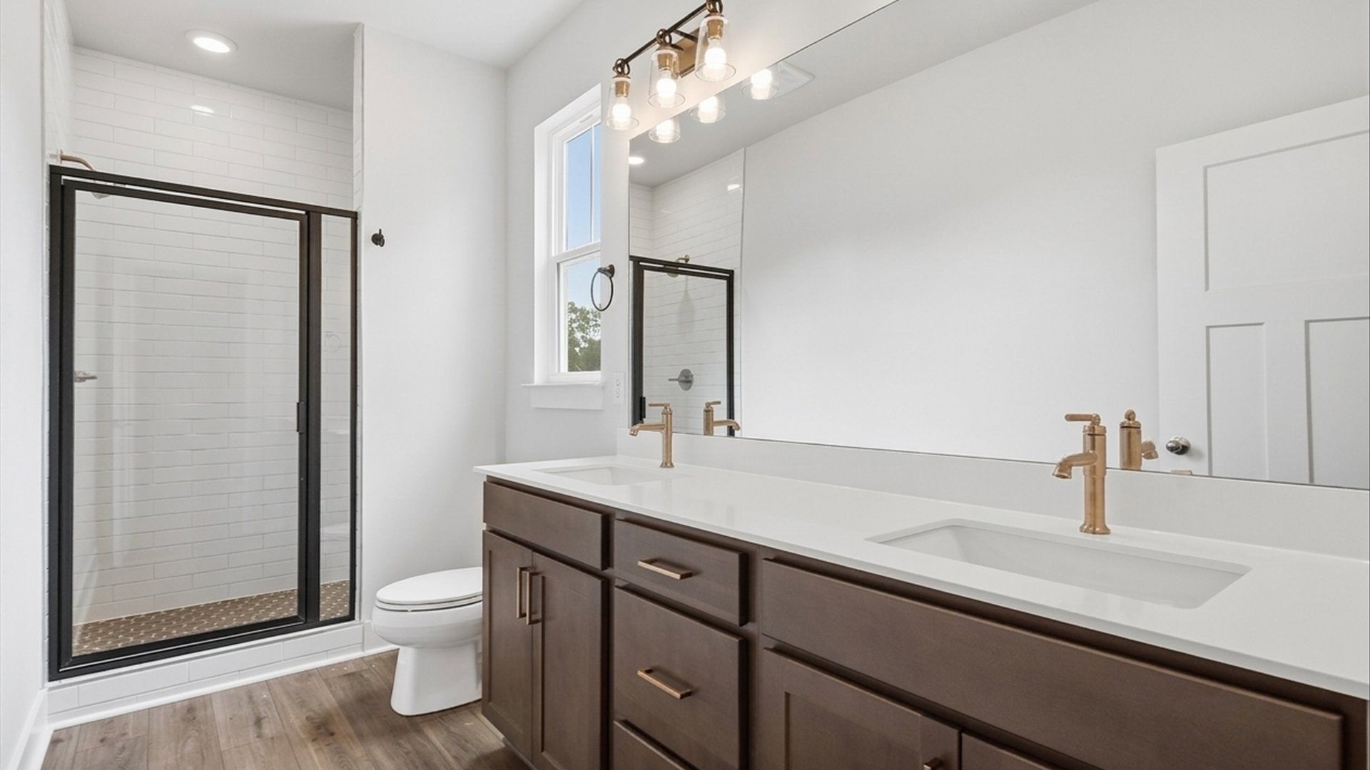 Primary bathroom designed for everyday comfort with elegant finishes throughout in Fountain Inn, SC