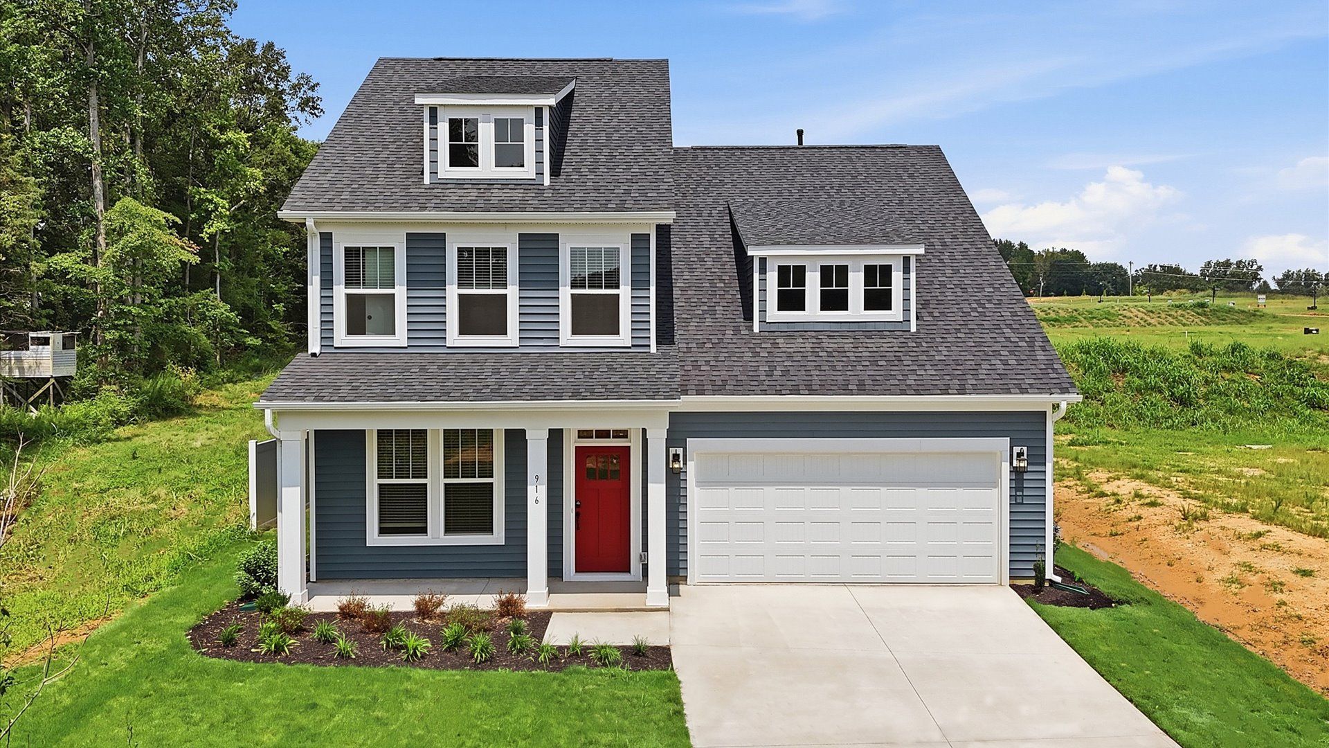 Functional design and eye-catching details in this accomplished townhome at Harrier Point