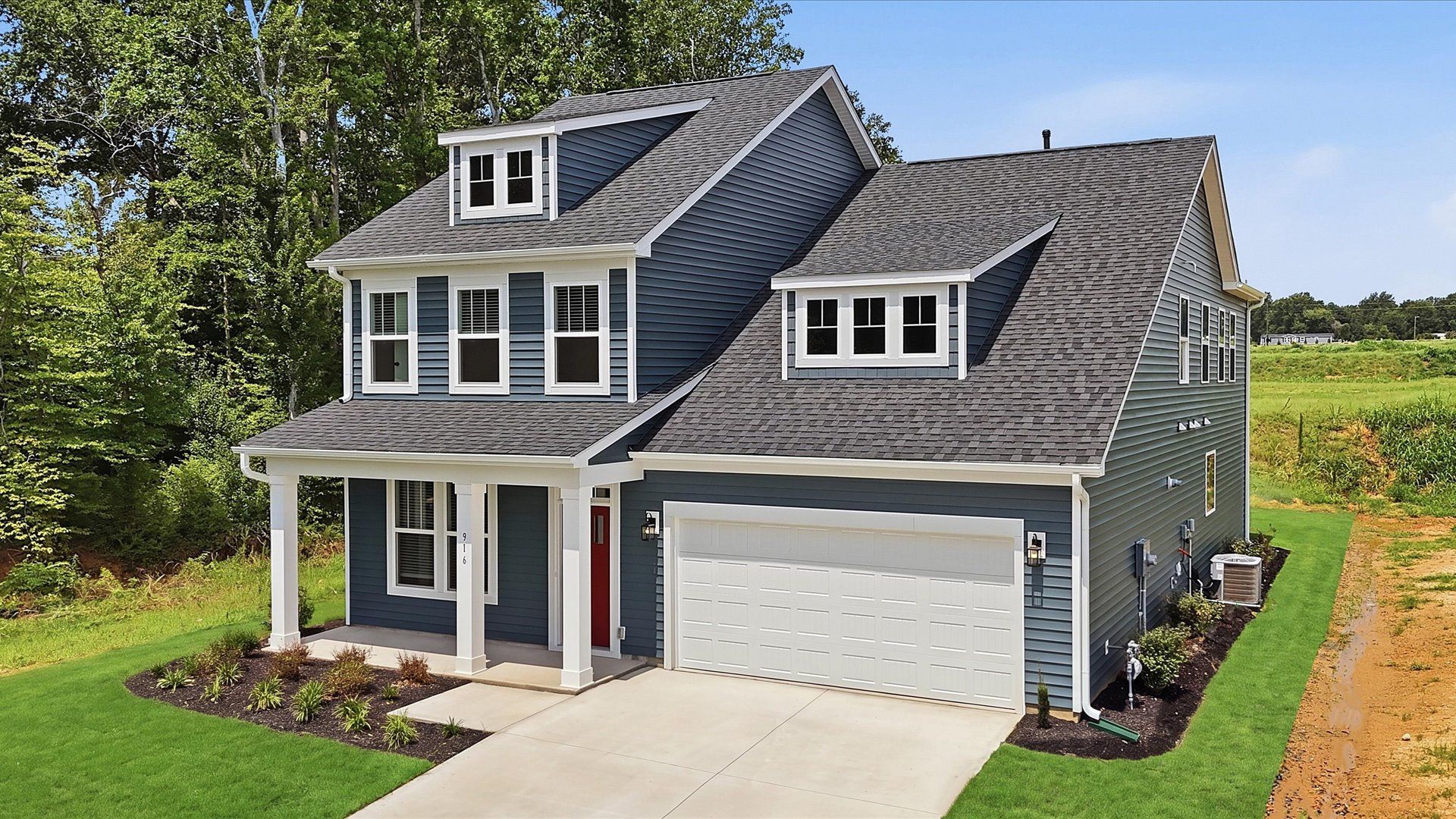Memorable first impression with elegant exterior design and exceptional materials in Woodruff, SC