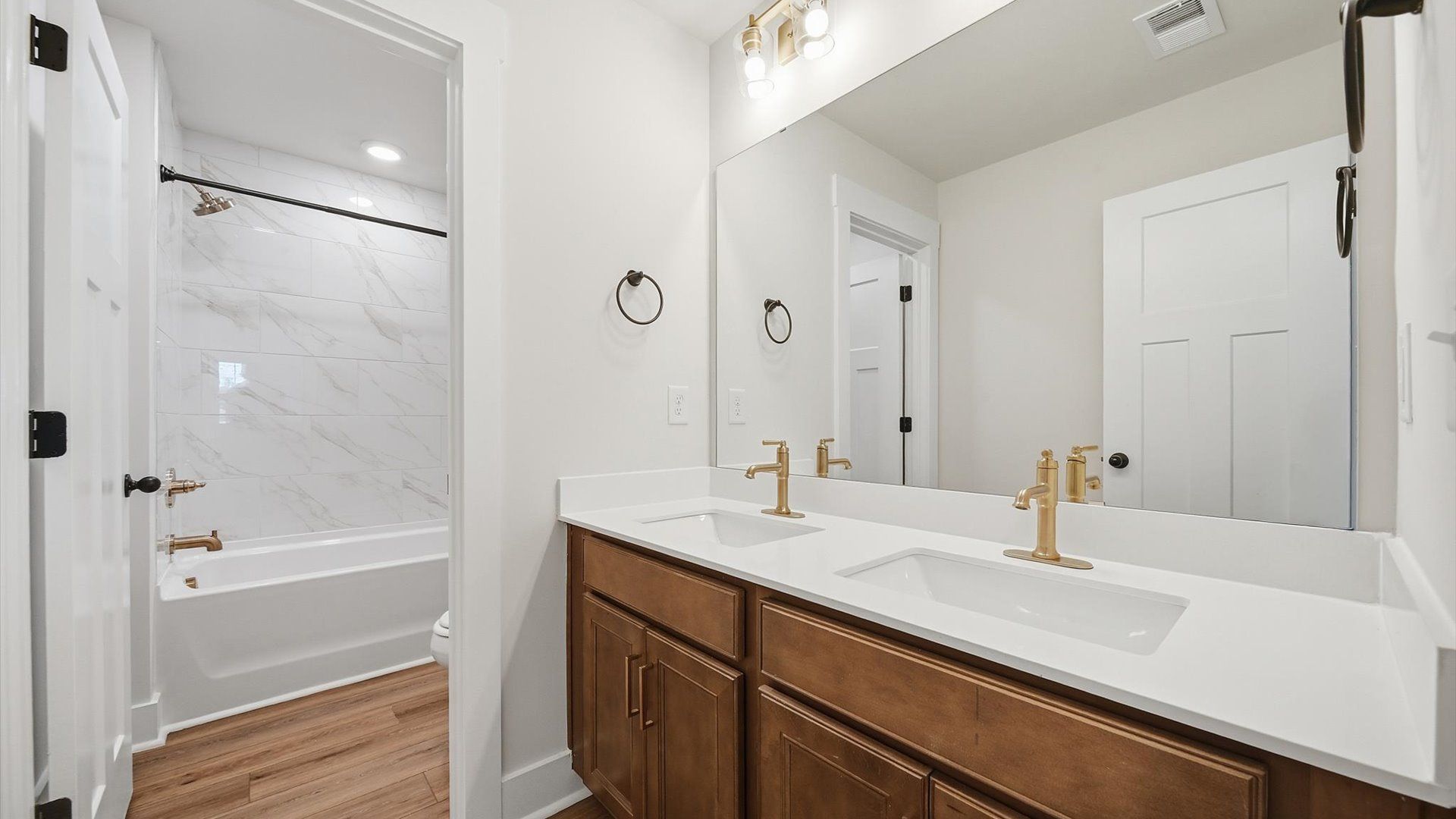Top-notch bathroom with current fixtures, tasteful materials, and elevated charm in Woodruff, SC