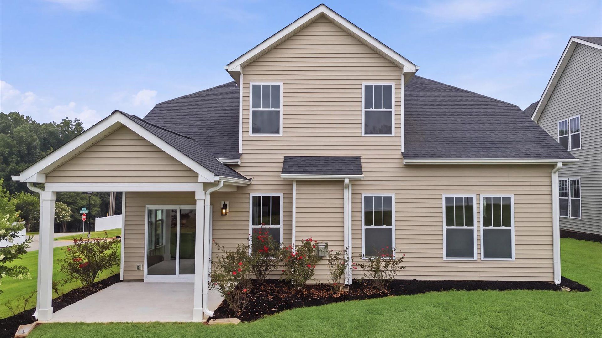 Established charm meets functional outdoor living with a spacious rear covered porch at the Fox Hollow community