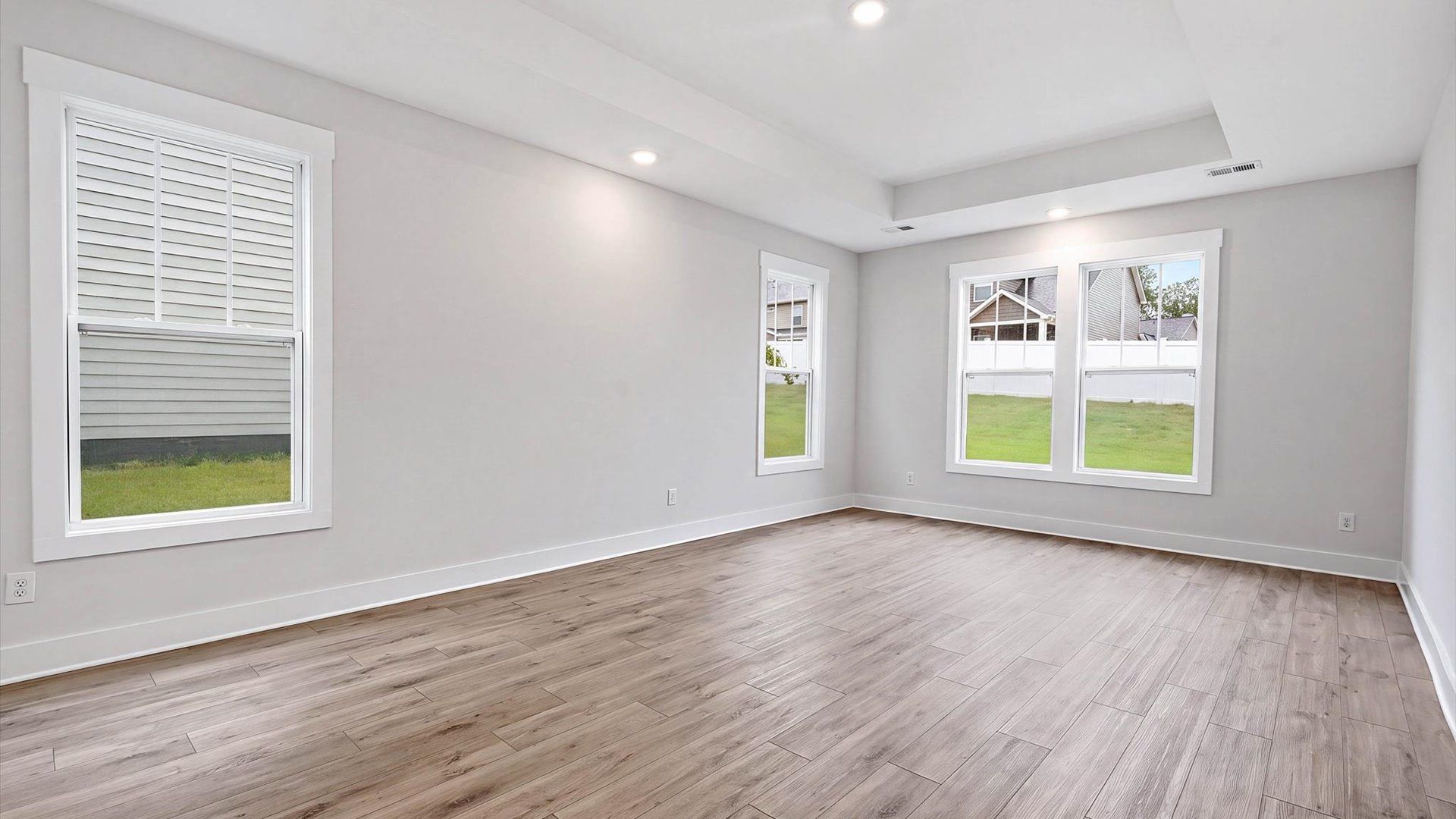 Distinguished primary bedroom featuring upscale finishes and timeless sophistication