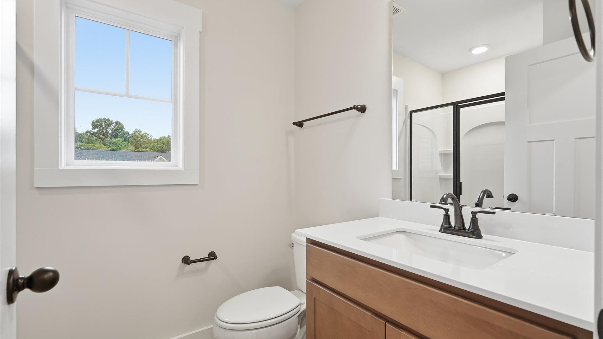 First-rate full bath featuring modern surfaces and a fresh, current color palette at Fox Hollow