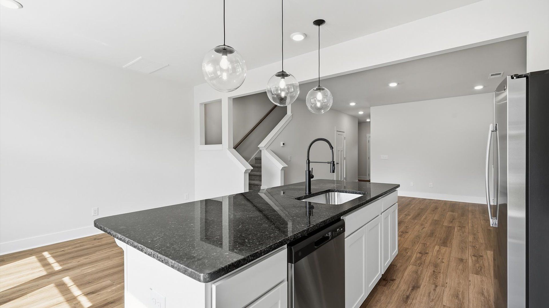 Open-concept kitchen designed to maximize both efficiency and entertaining potential in Greenville, SC