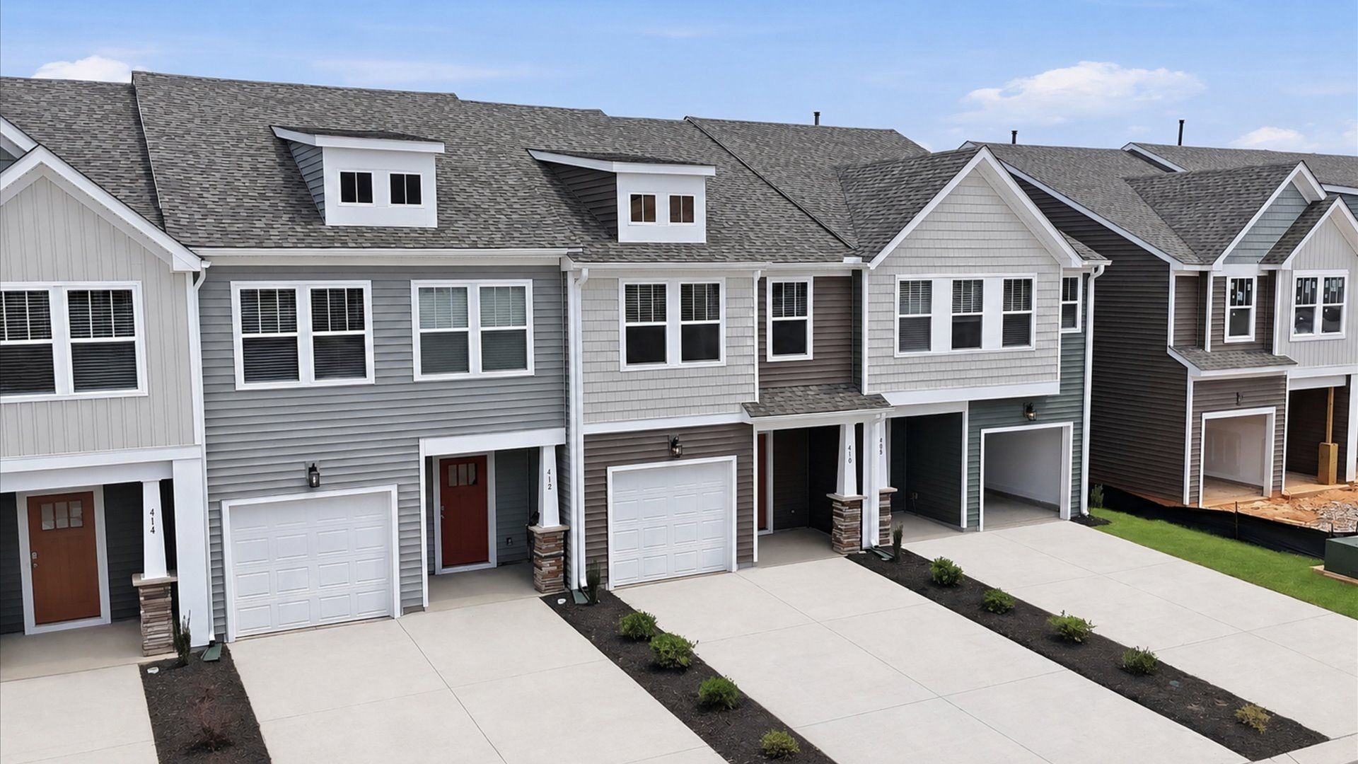 First-rate curb appeal with clean lines and a welcoming front entry