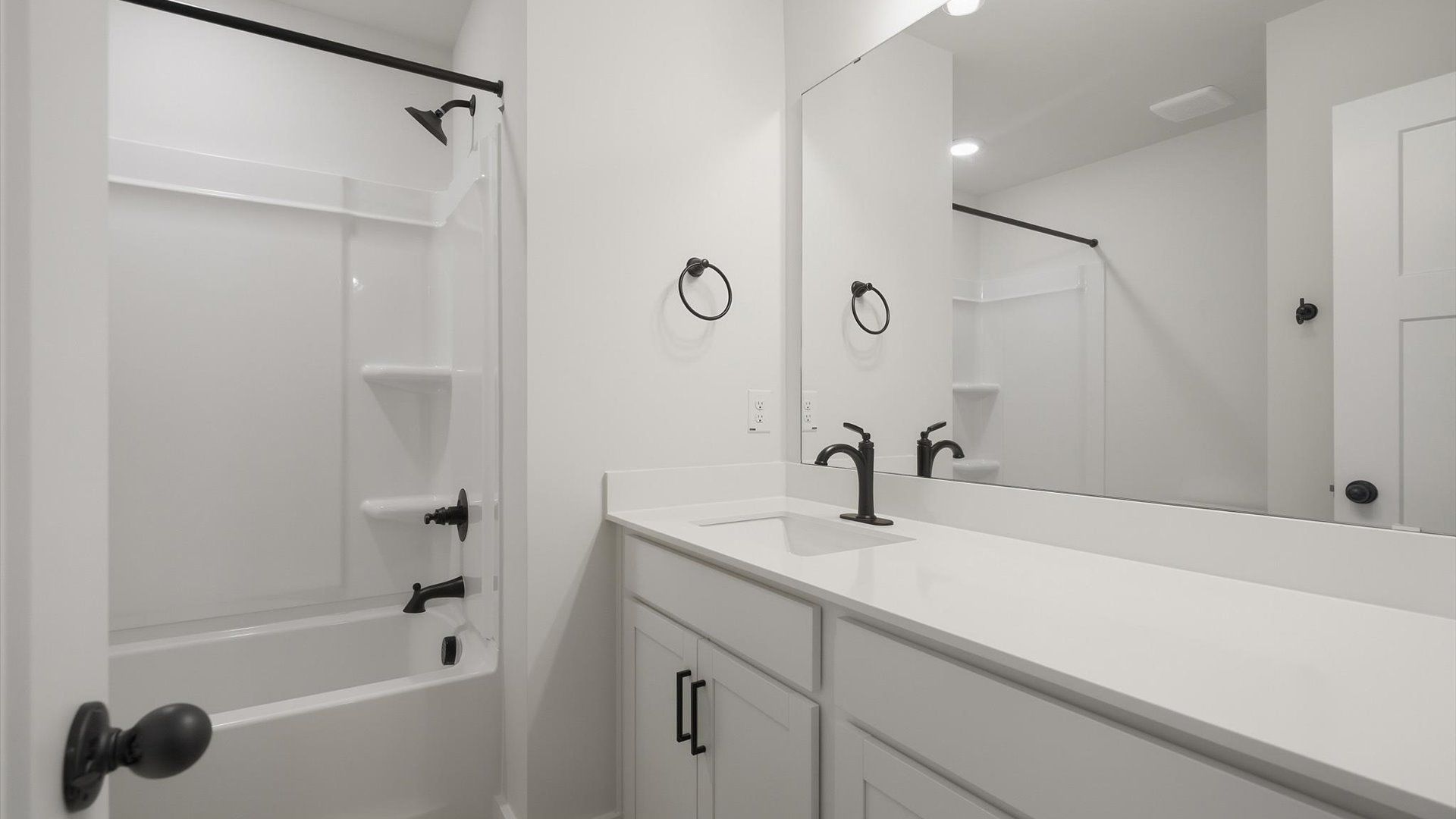 First-class guest bath featuring stylish fixtures and modern design elements