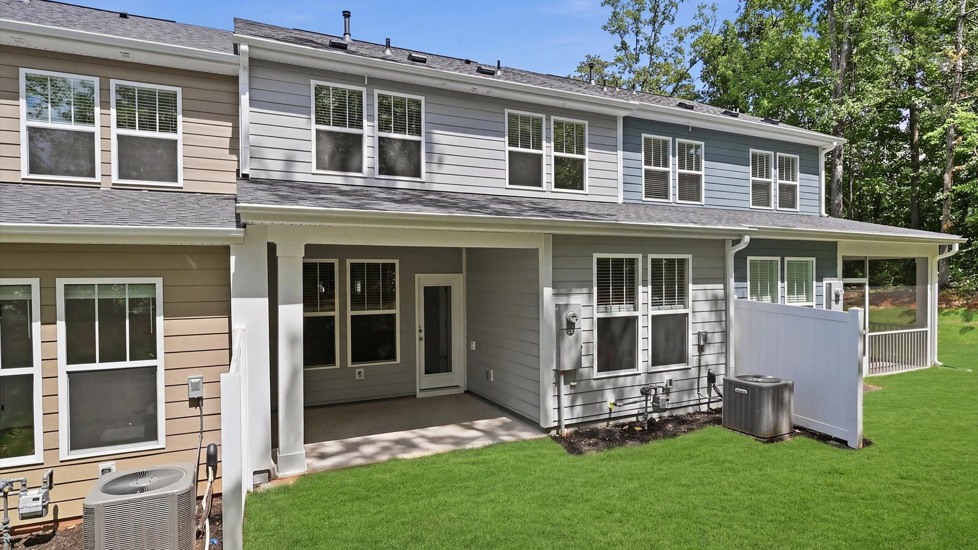 Comfortable outdoor living begins on this spacious covered porch