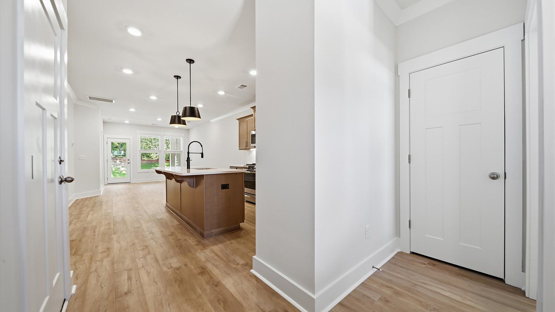 First-class entryway featuring hardwood floors and accomplished architectural style