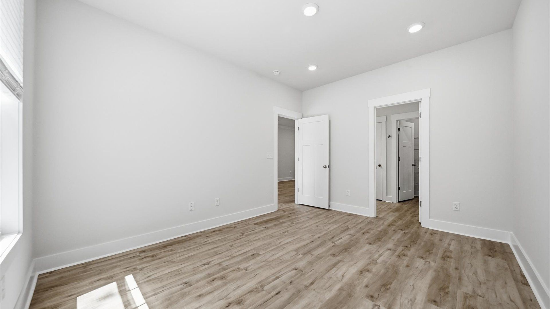 Spacious and serene primary suite with thoughtful design in a desirable DRB Homes community