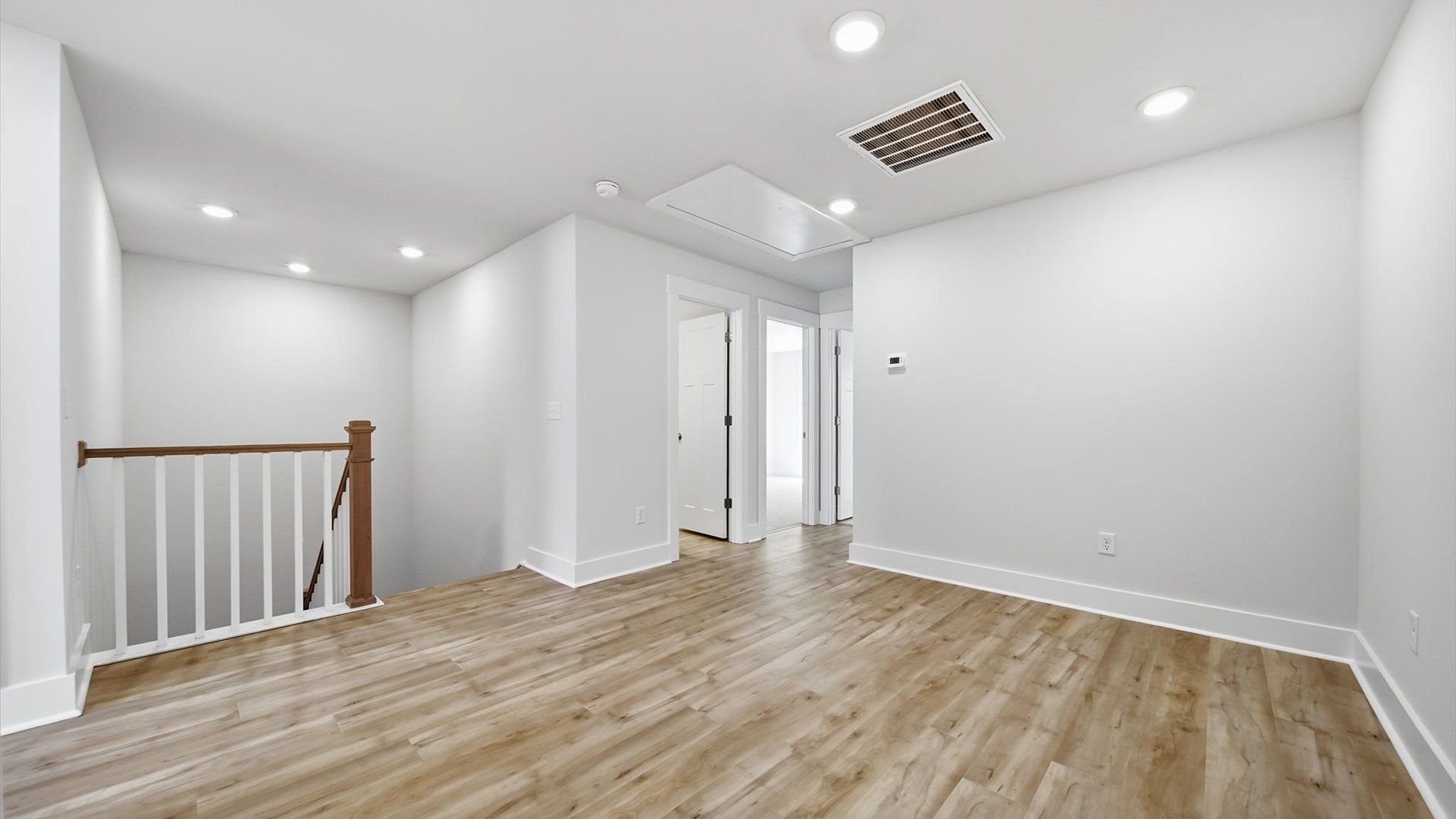 Bright loft with hardwood flooring and a comfortable setting for entertaining or quiet evenings