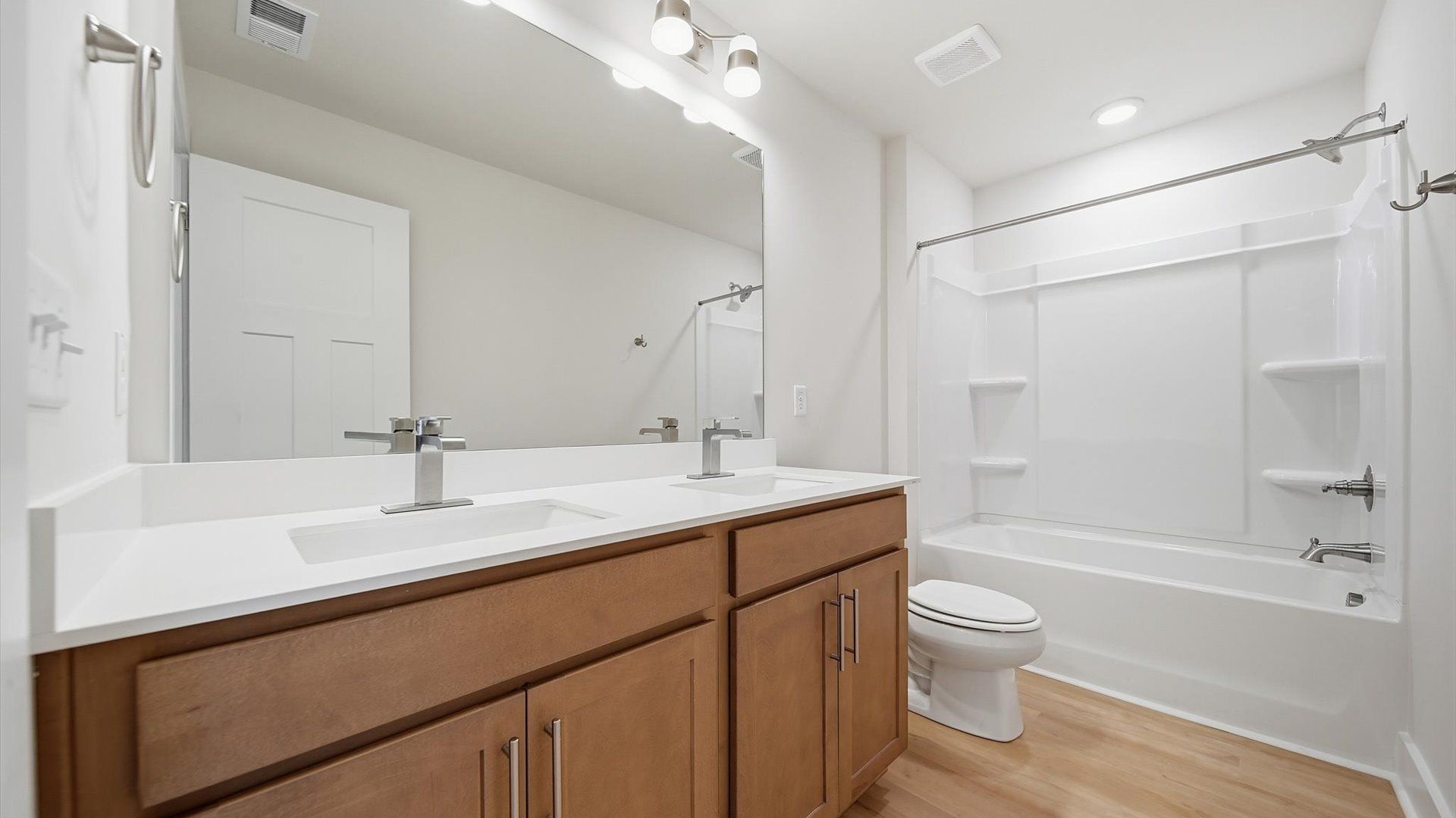 Top-notch bathroom with current fixtures, tasteful materials, and elevated charm