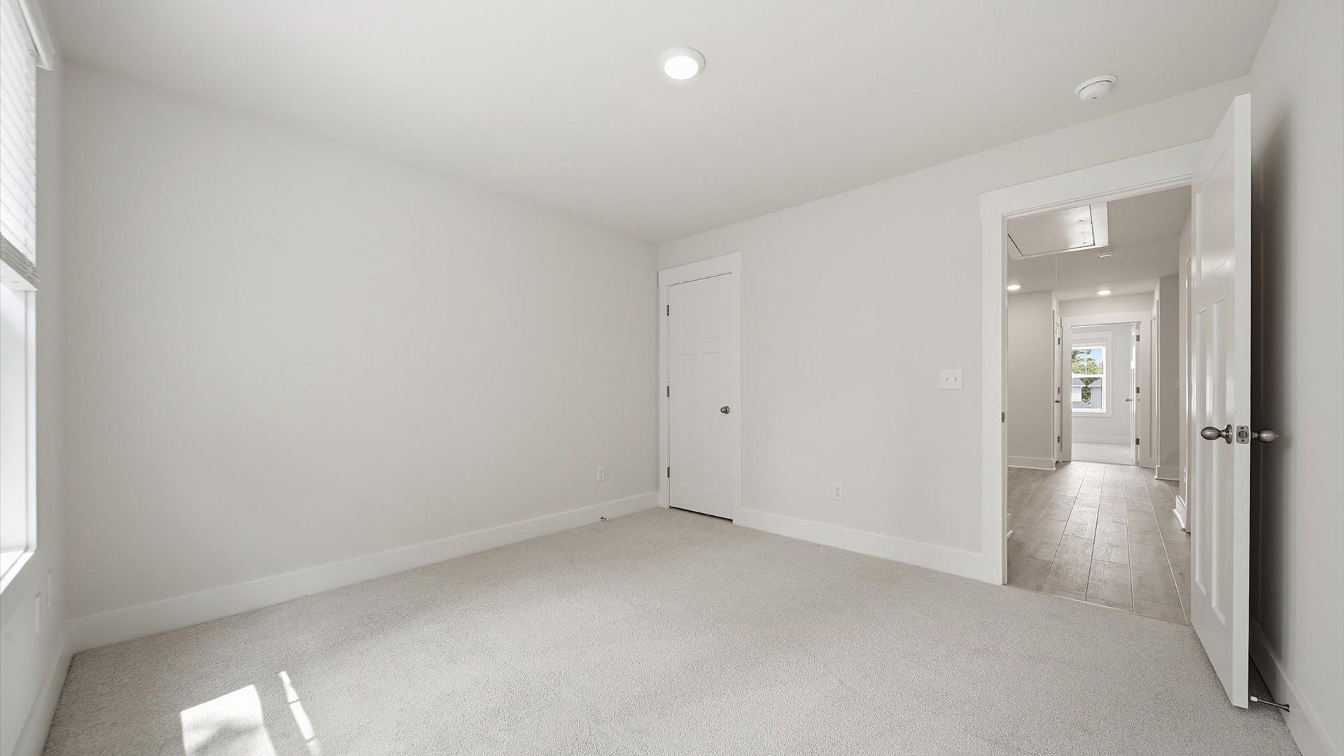 Memorable space offering plush carpet underfoot and a thoughtfully planned walk-in closet