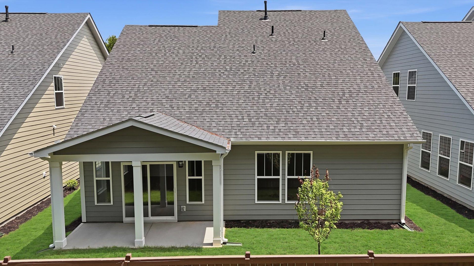 Established charm meets functional outdoor living with a spacious rear covered porch