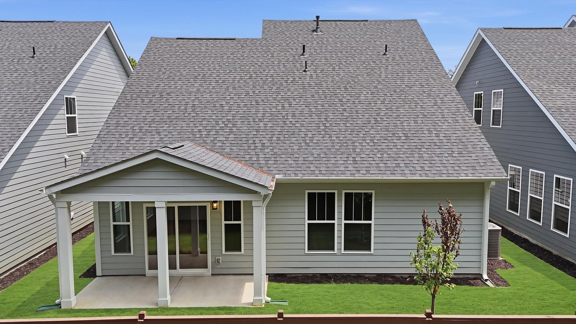 Beautiful backyard views begin from this spacious covered outdoor retreat