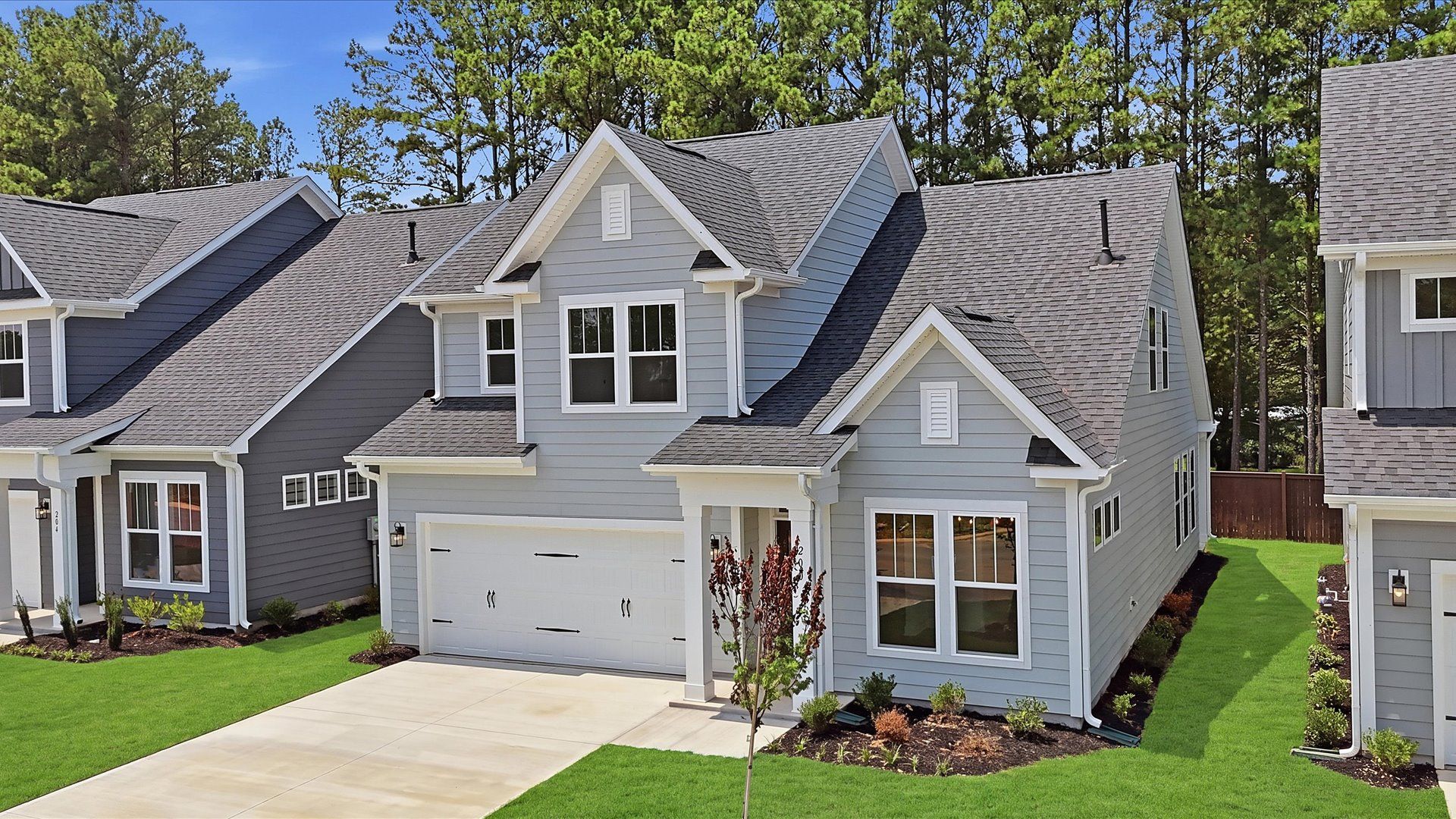 Discover timeless exterior design in this exceptional Barton Hollow home