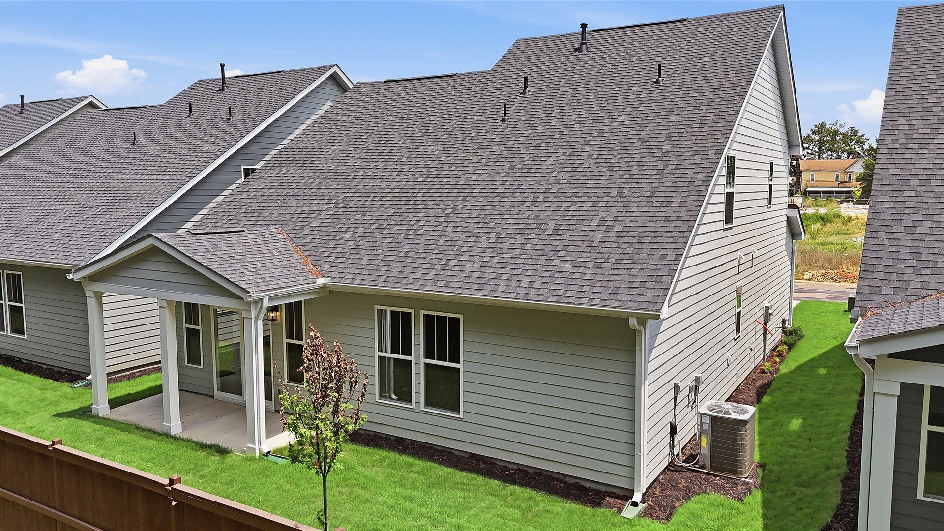 Enjoy the best of indoor and outdoor living with a covered rear porch