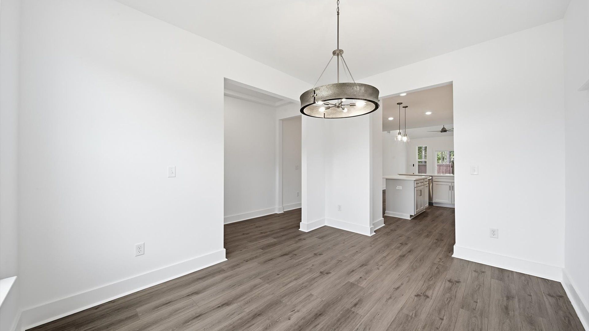 Memorable meals start in this exclusive dining space featuring elegant trim and natural light