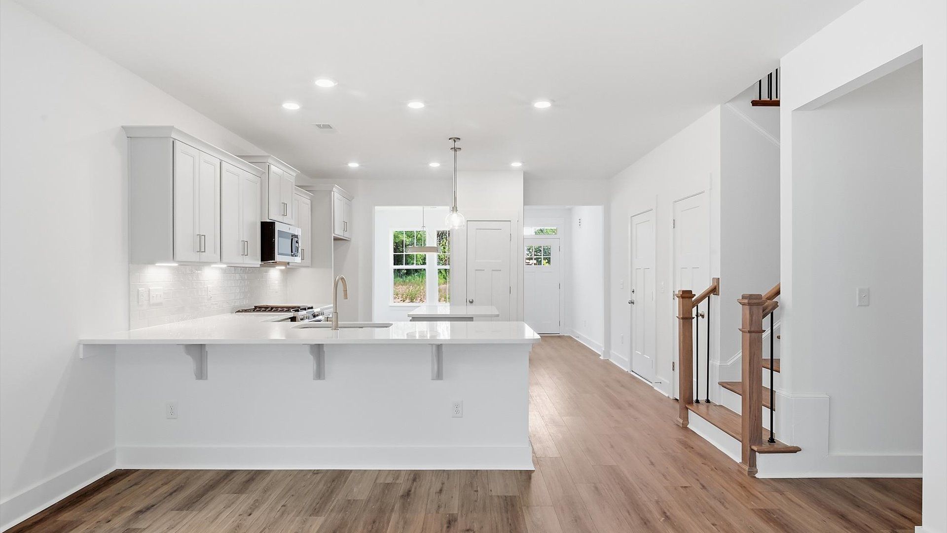 First-class finishes and a thoughtfully scaled island highlight this elegant kitchen space