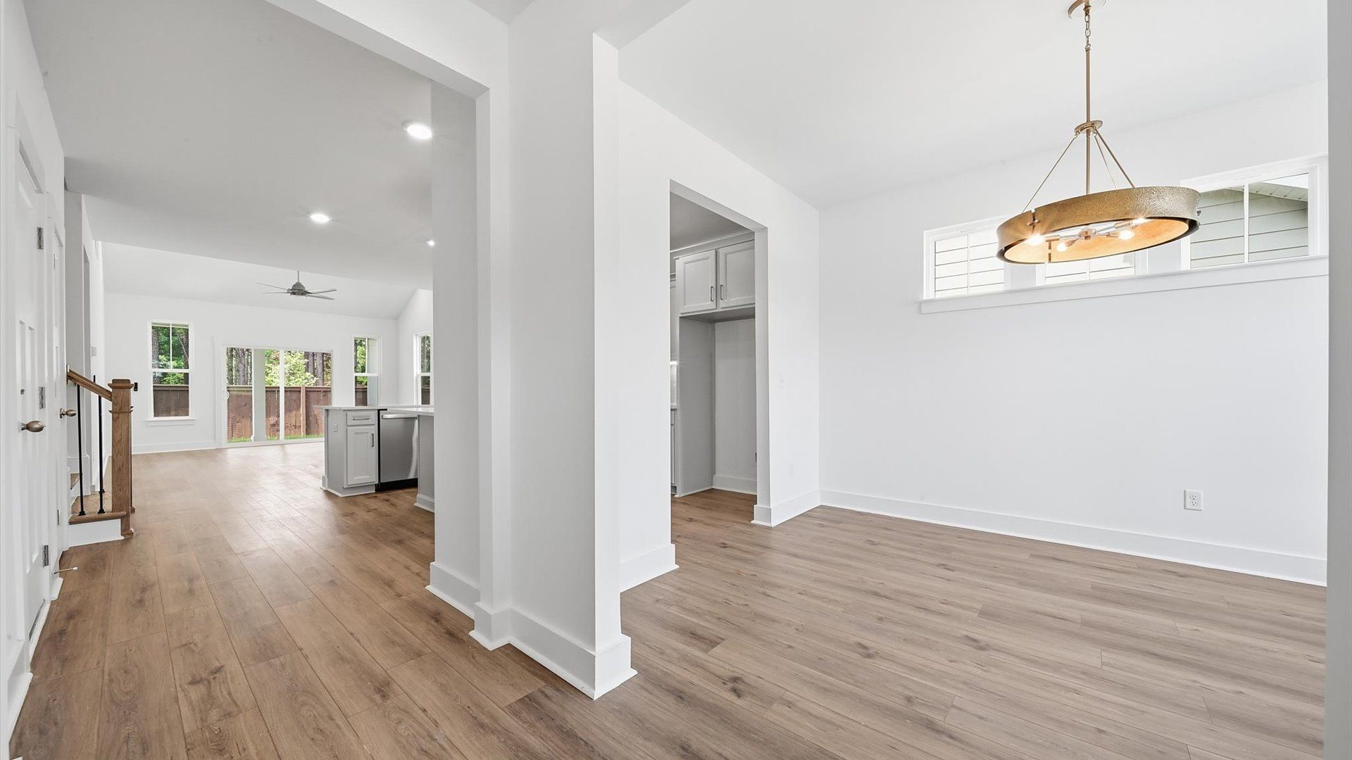 Superior design begins at the front door with a hardwood floor foyer and elegant sightlines