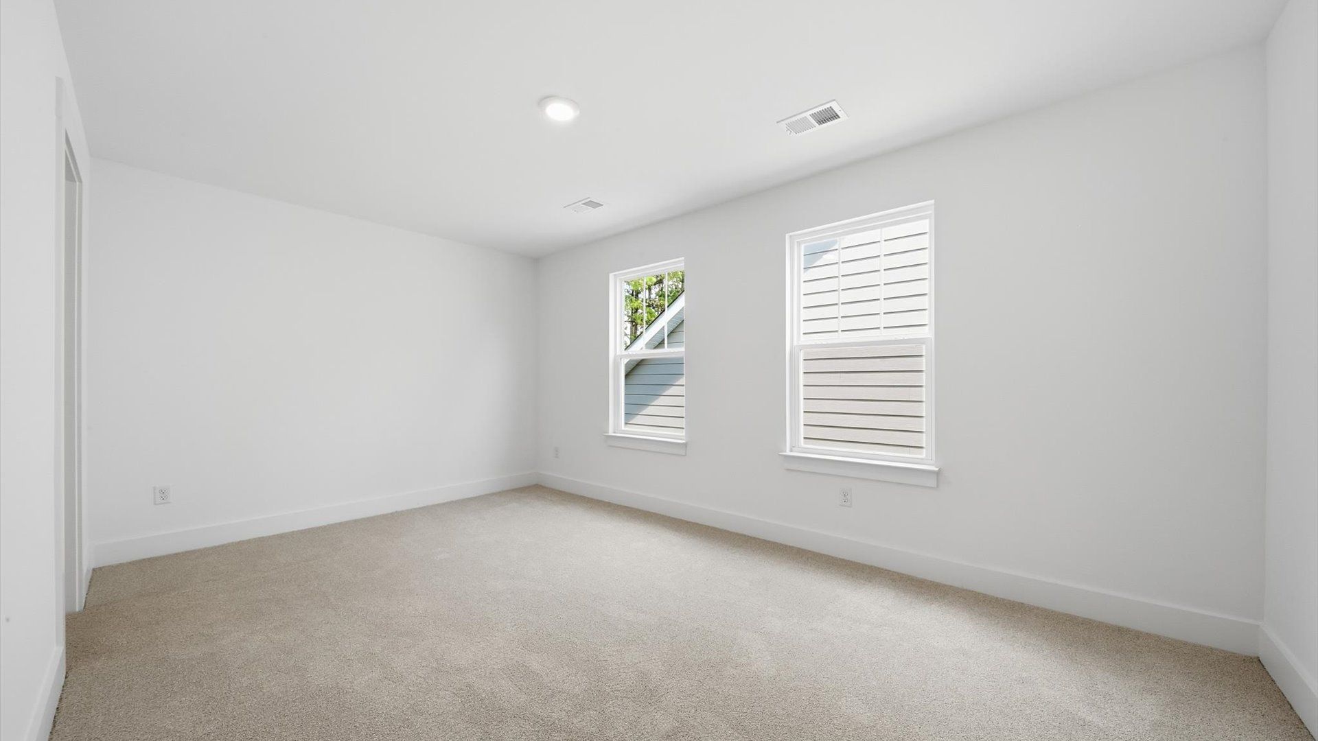 Memorable space offering plush carpet underfoot and a thoughtfully planned walk-in closet