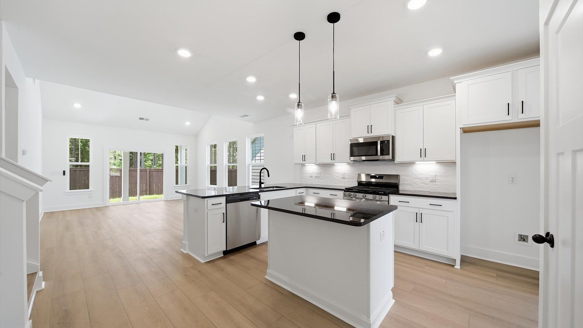 Well-designed kitchen with a center island and tasteful finishes that elevate everyday living