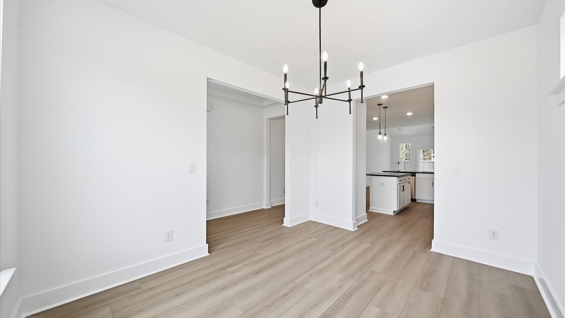 Established charm meets modern elegance in this first-rate dining room by DRB Homes