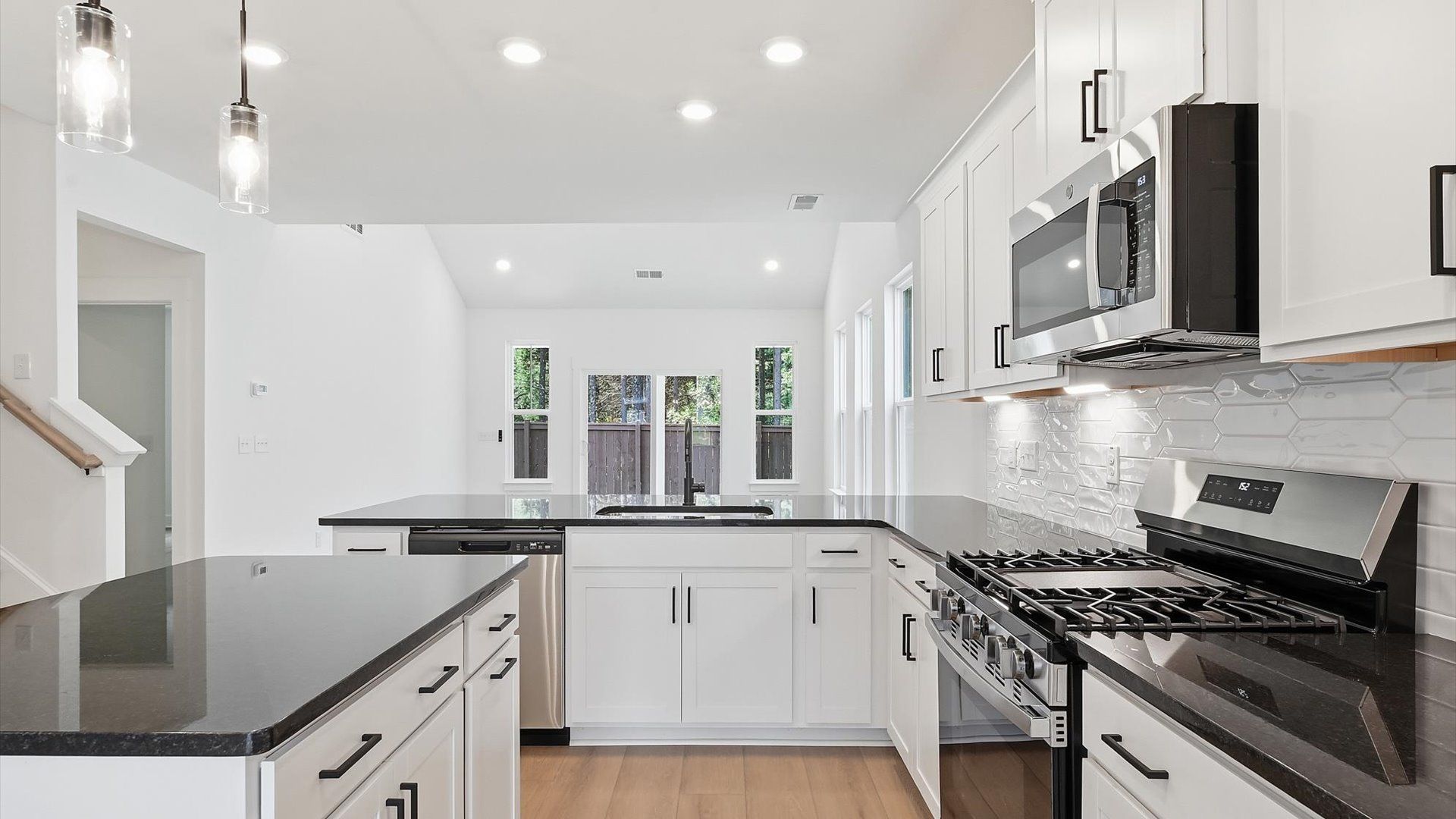 Accomplished design in a kitchen that blends function and form with a right-sized island