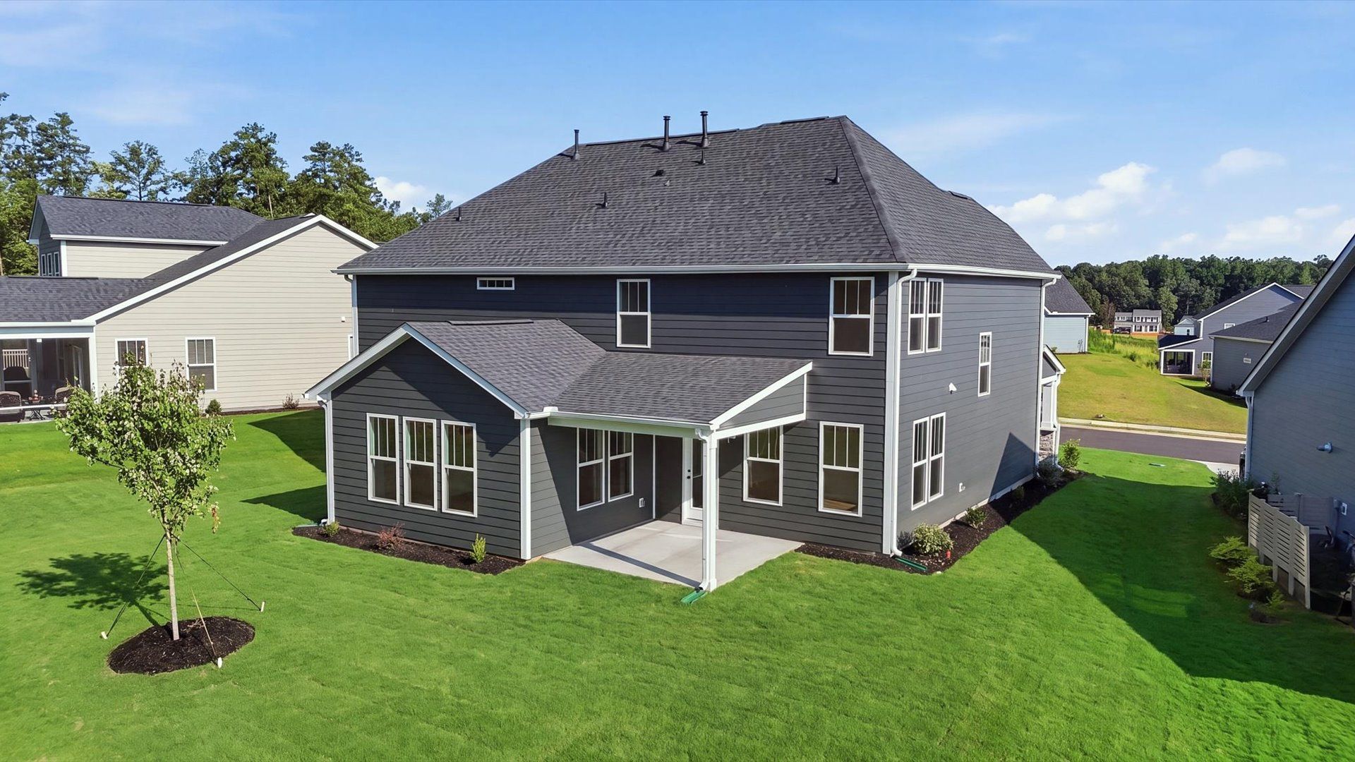 First-class design featuring a rear covered porch and tasteful architectural details